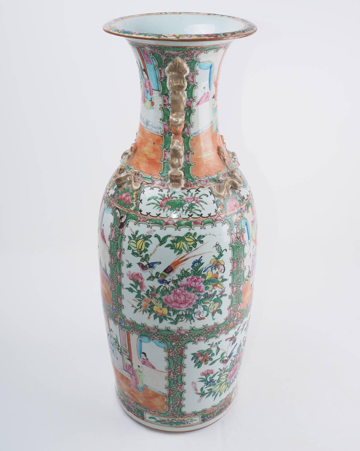 A pair of Cantonese export polychrome enameled porcelain vases, circa 1870.