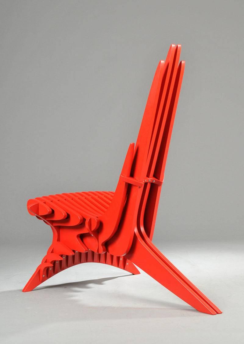 This stunning chair was the prototype for a limited edition of 50 from Peter Qvist Lorentsen in red lacquered birch plywood.