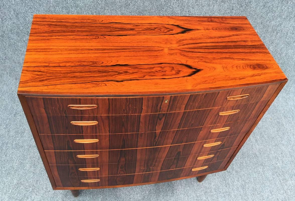 Danish rosewood bowfront chest of six drawers.