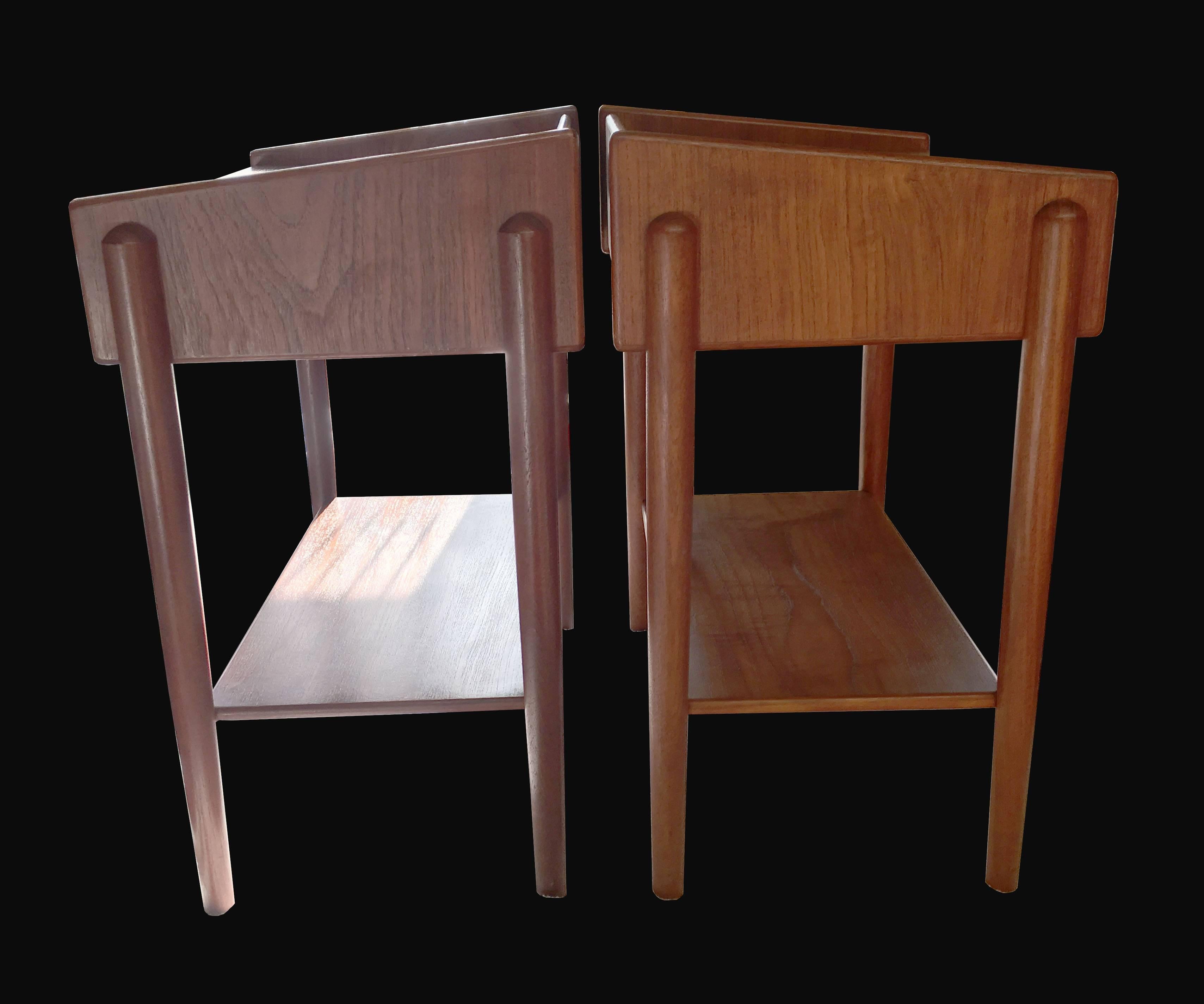 A cool pair of Scandinavian Modern, midcentury teak single drawer side tables with undershelf designed by Børge Mogensen for Søborg Mobelfabrik in the early 1960s.