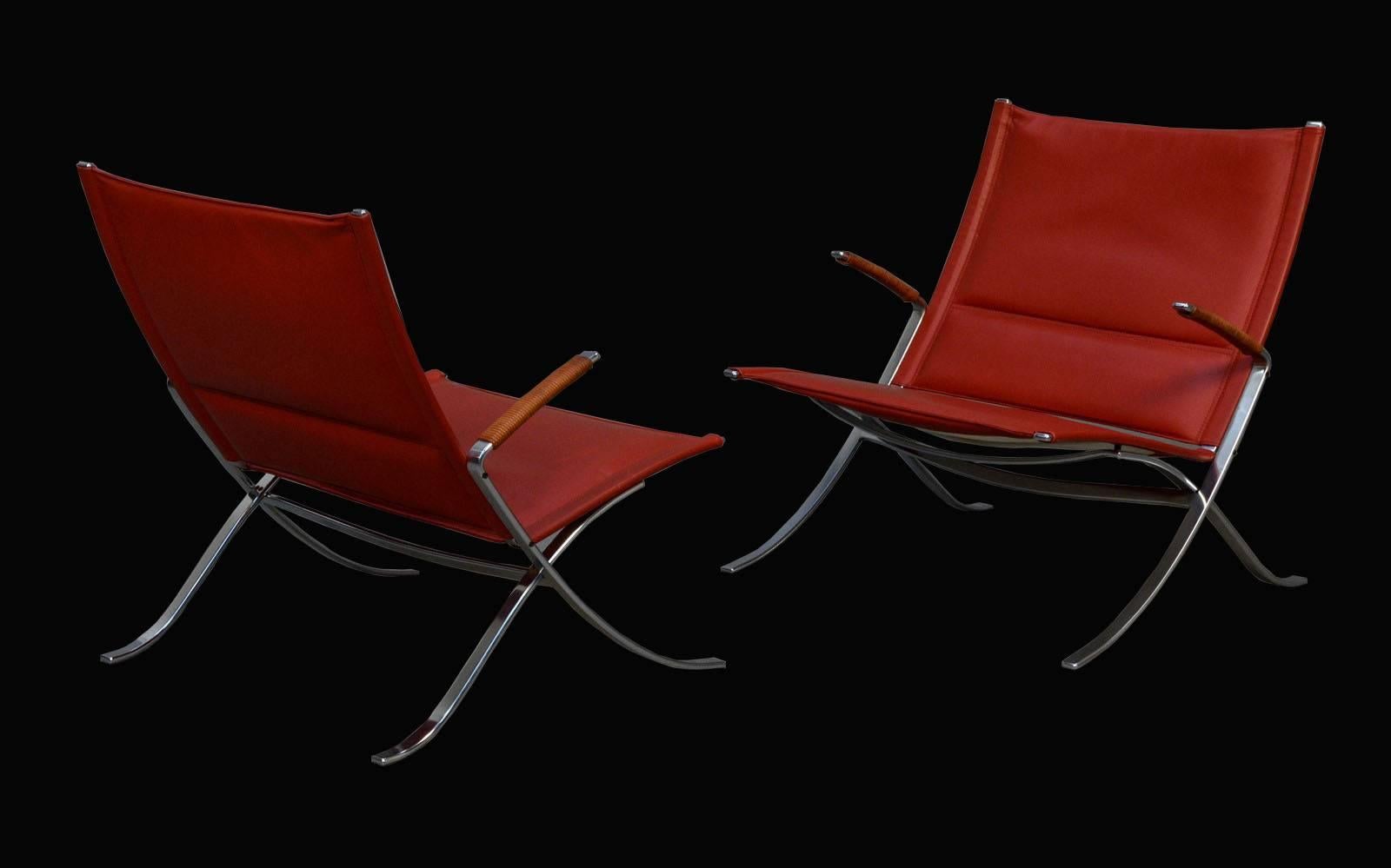 A stunning original first edition pair of X-chairs by Jorgen Kastholm & Preben Fabricius for Alfred Kill in steel and oxblood leather.