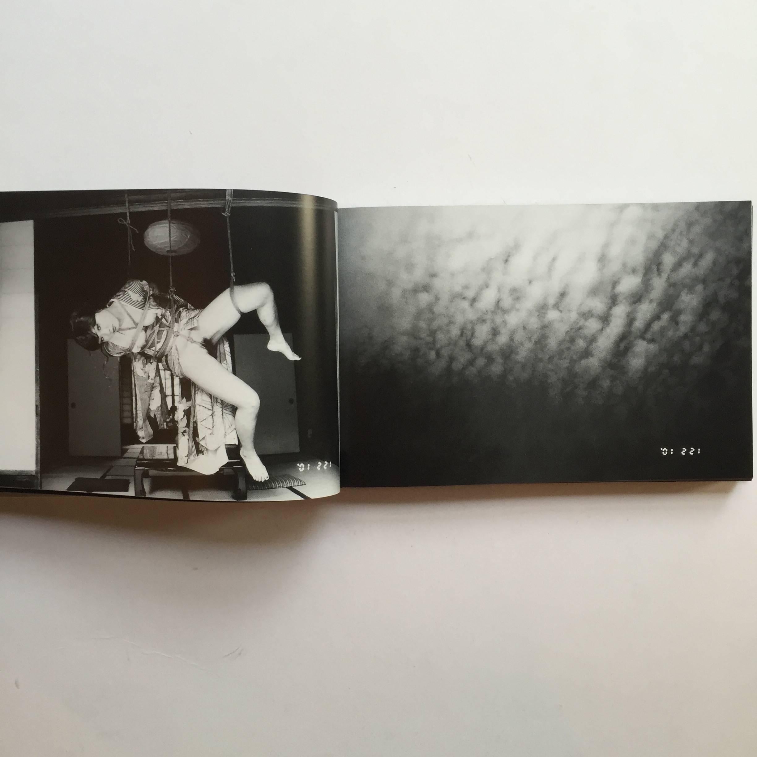 First edition, published by Aat Room, 2002.

A photo-diary collection of Araki’s works created over the course of 2001. Digitally dated, full bleed black and white images in typical Araki style - women suspended in bondage ropes, painted nudes and