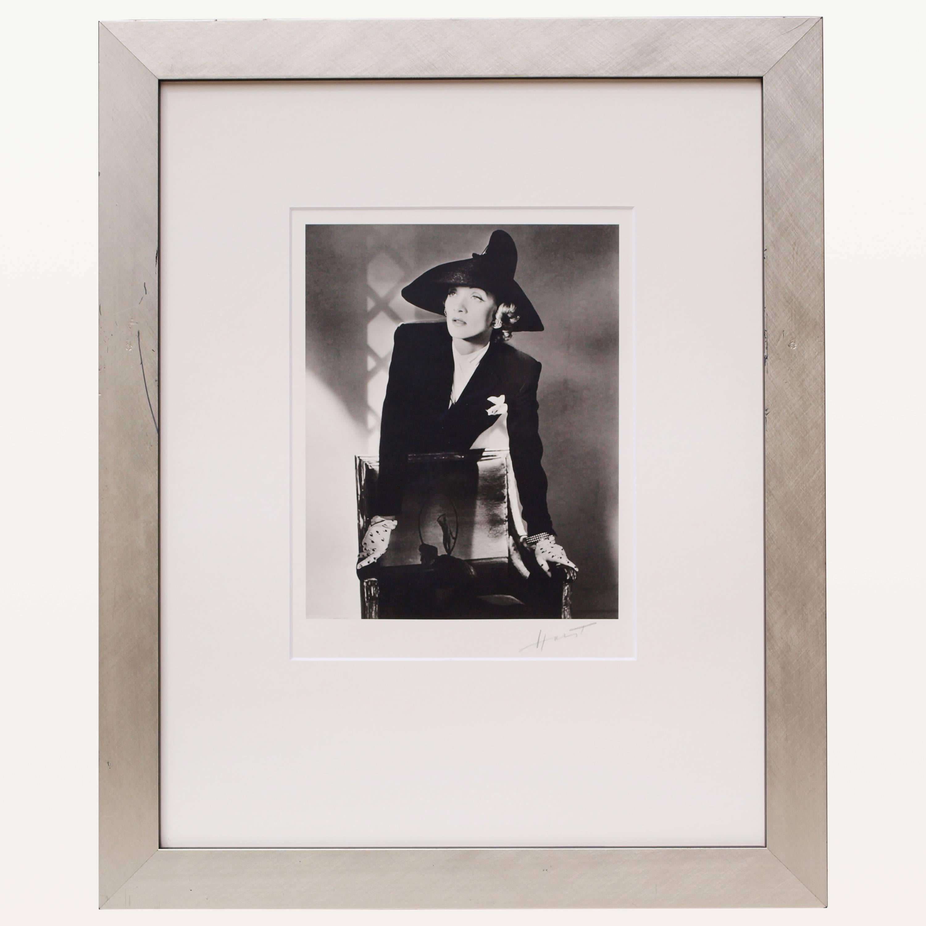 Title: Marlene Dietrich 
Print: Silver Geletin 
Date: 1942, printed later
Signature: Signed Horst in Pencil on Recto and Vesrso, stamped Horst

Horst P. Horst (1906-1999) created images that transcend fashion and time. He was a master of light,