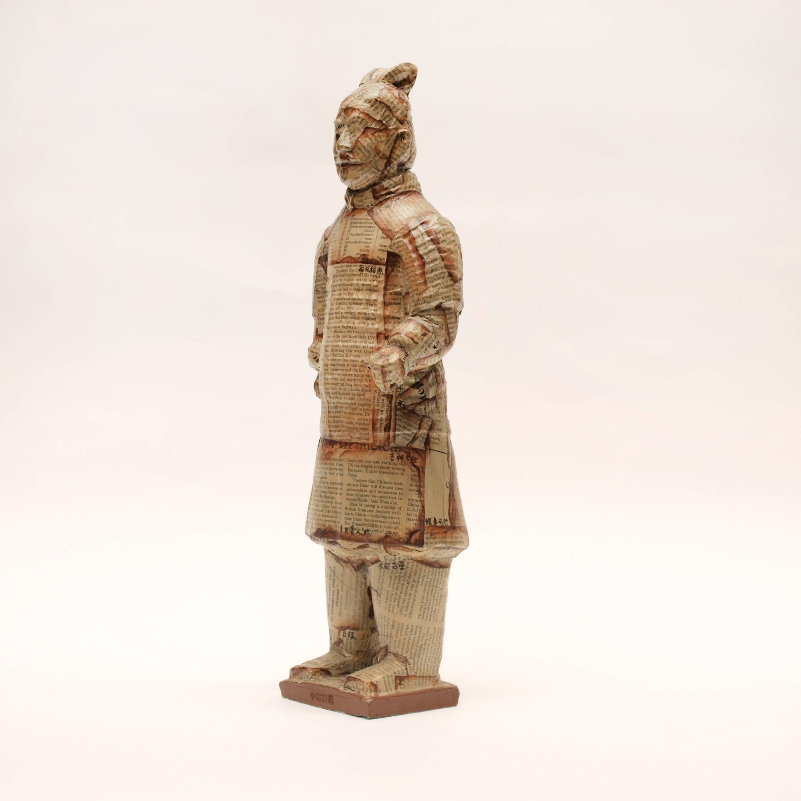 This terracotta warrior sculpture by Chinese collaborative artist duo, Liu Fenghua and Liu Yong, is one of the earliest of an ever-expanding army of one-of-a-kind decorated terracotta statues. Made in 2004 for the first series of terracotta