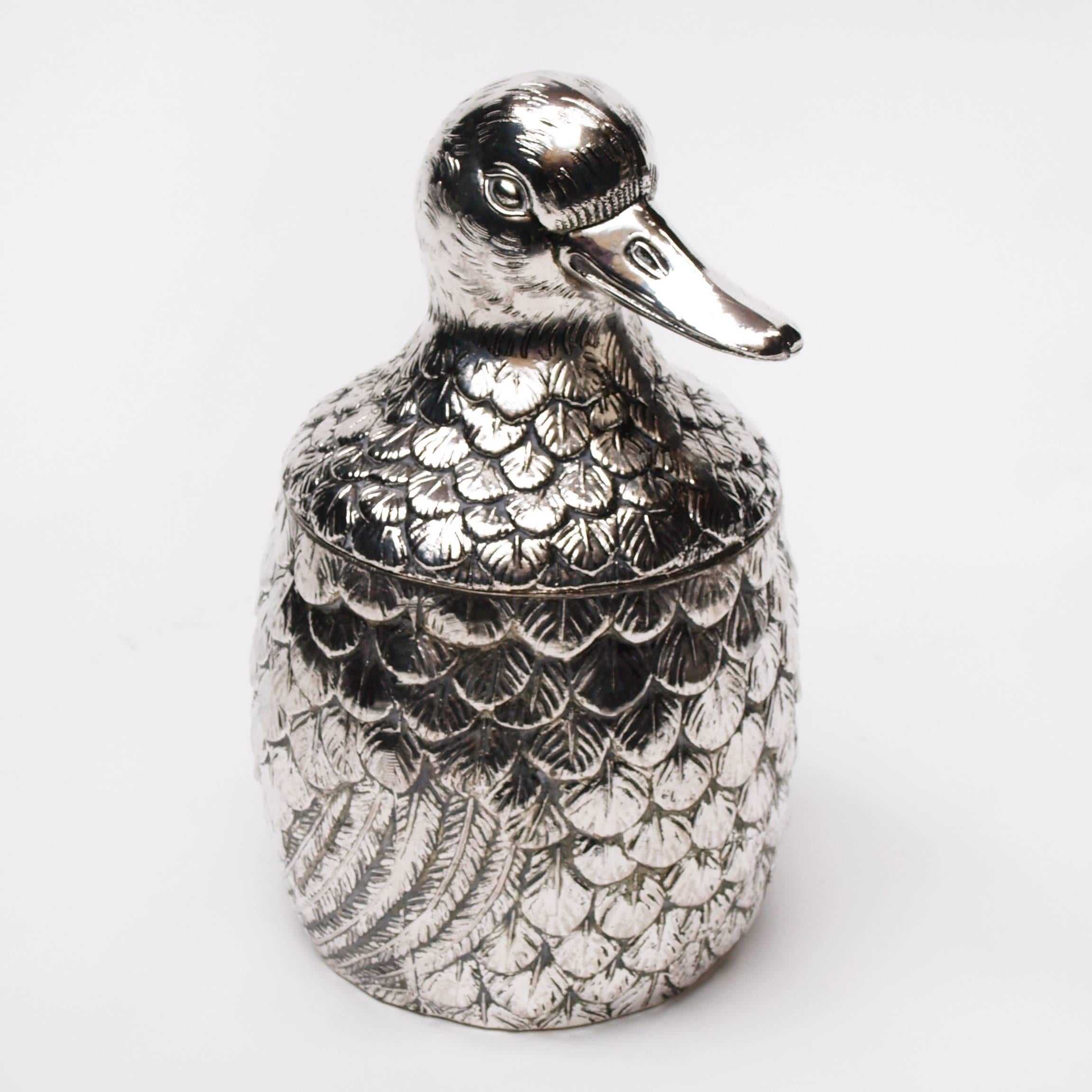 A charming silver metal Mauro Manetti duck-shaped ice bucket, stamped towards the base ‘Made in Italy M\M’. Mauro Manetti’s elaborate ice bucket designs have become archetypal and so often imitated.