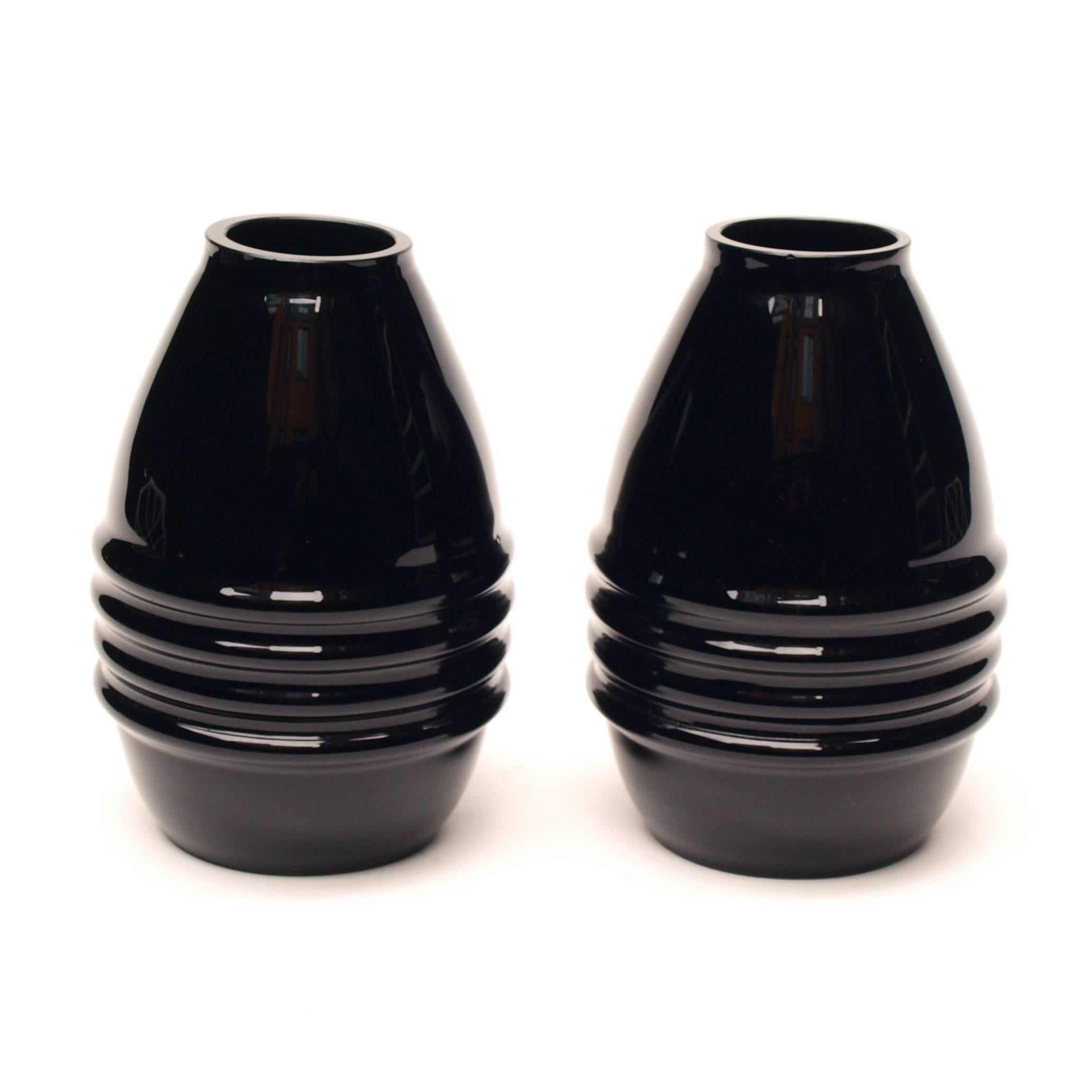 A simple pair of stunning black opaline vases from the 1930s attributed to Jacques Adnet.