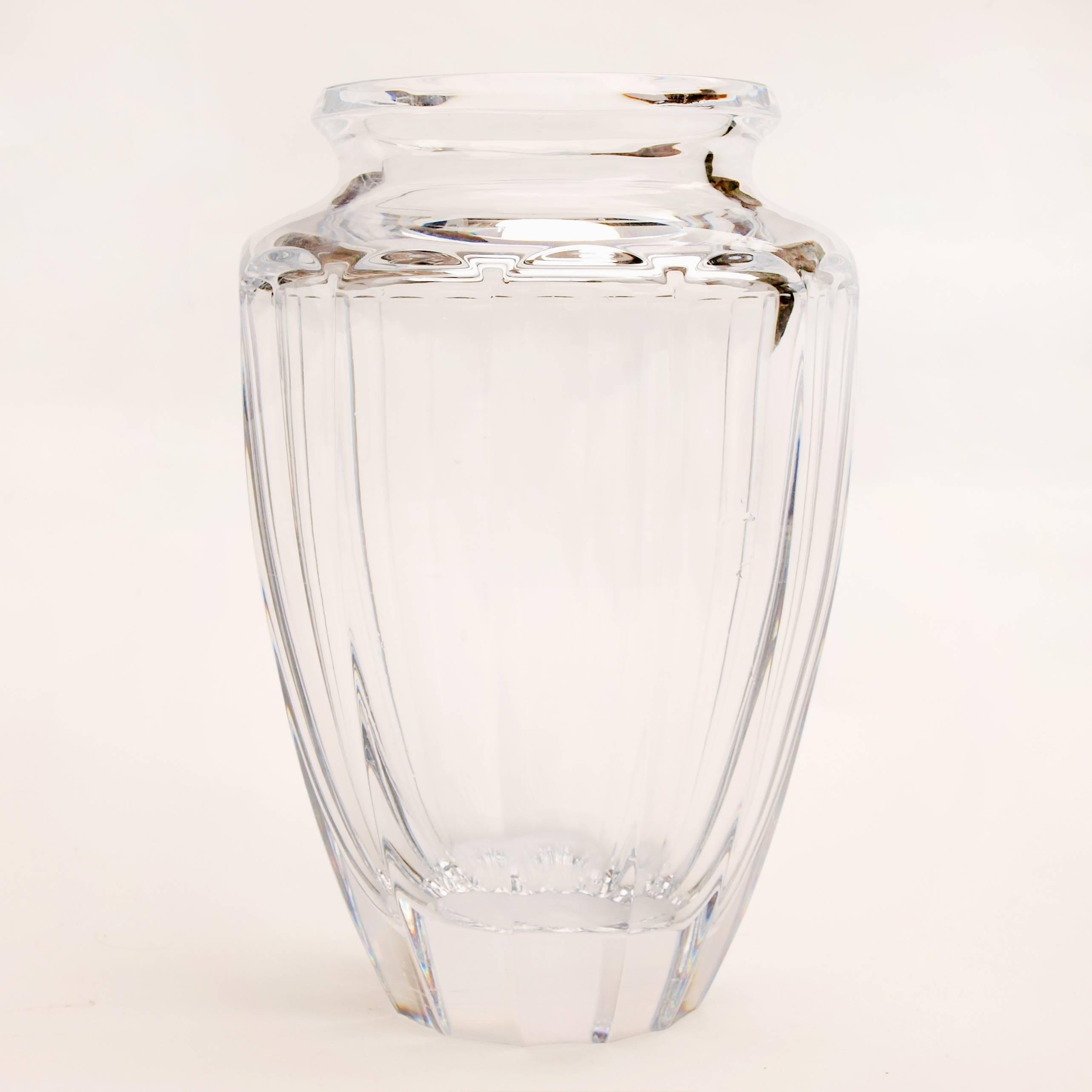 An urn shaped crystal vase designed and manufactured by French art glass company Daum. Signed to the base.
 