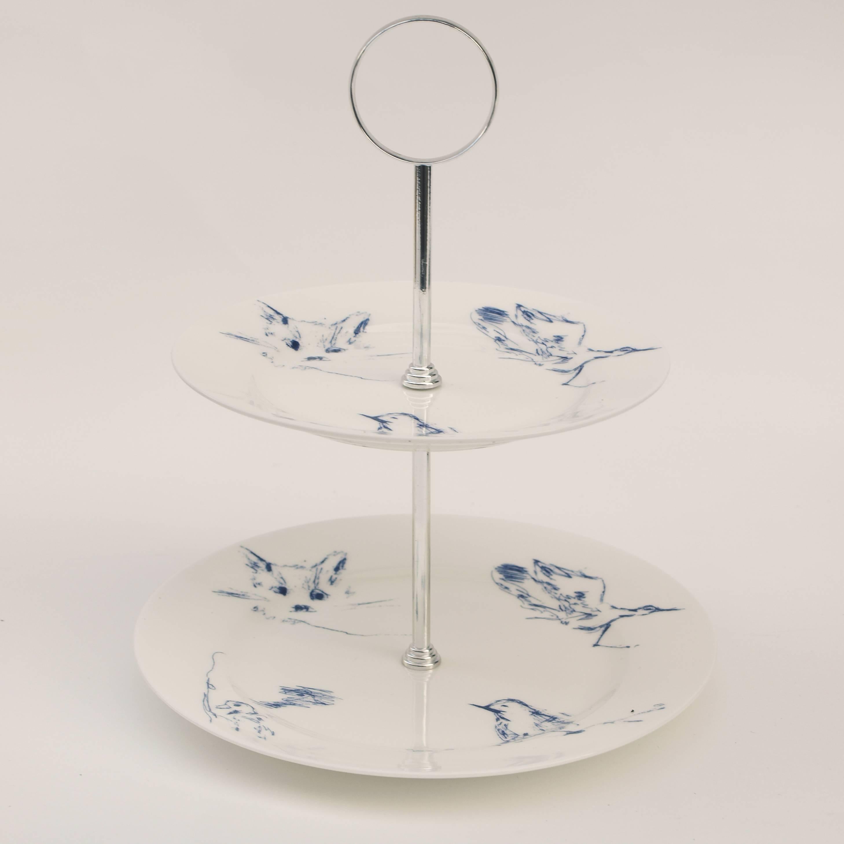 A Signed Tracey Emin bone china cake stand, produced as part of the 'Docket and His Bird Collection' for Emin International.