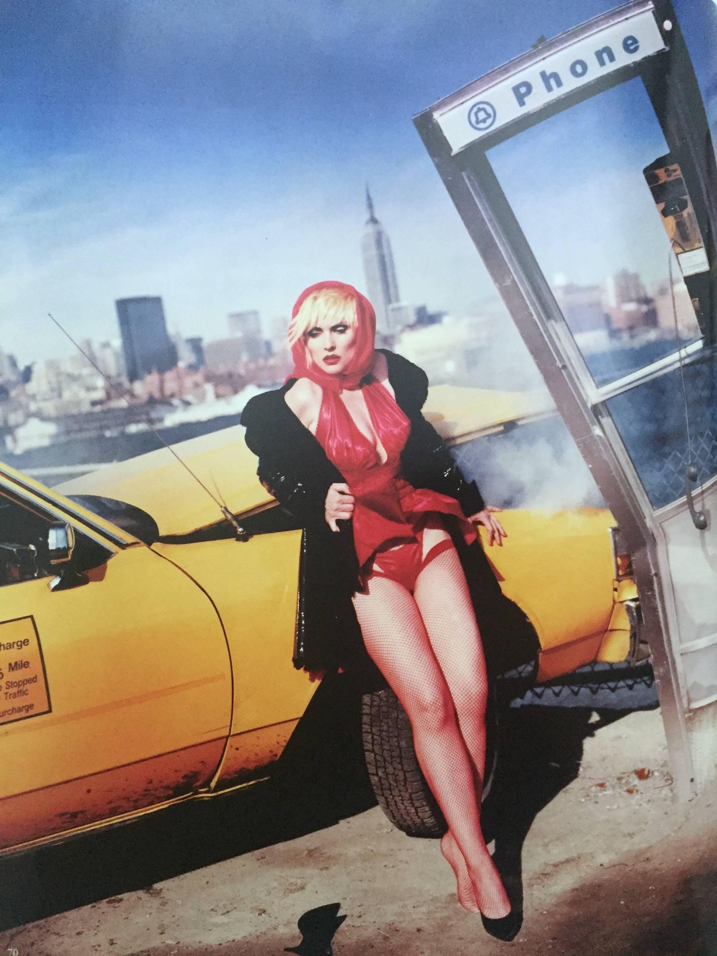 Numbered first edition, published by Simon and Schuster, 1996.

David LaChapelle has become one of the most revolutionary photographers of all time, elevating the 'celebrity' to a fictional and theatrical idea, through his extreme sets and