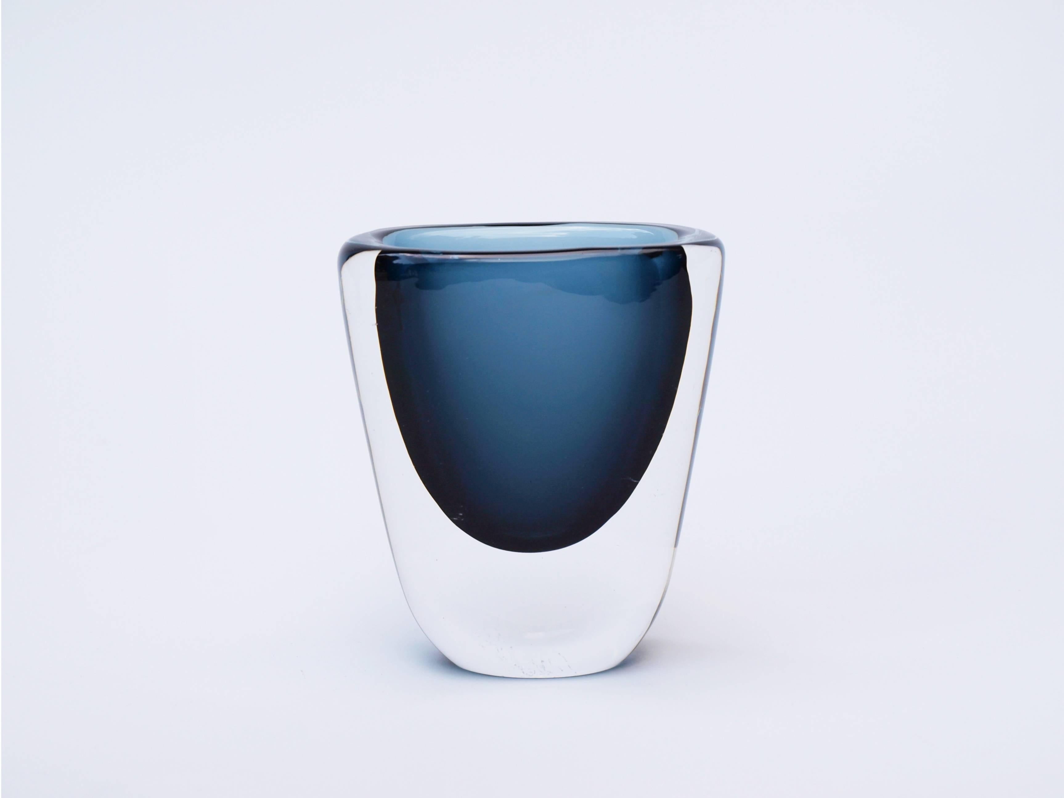 A beautiful organic glass vase designed by Swedish glass artist, Nils Landberg for Orrefors. The vase is signed ‘Orrefors NU3 953/3’.