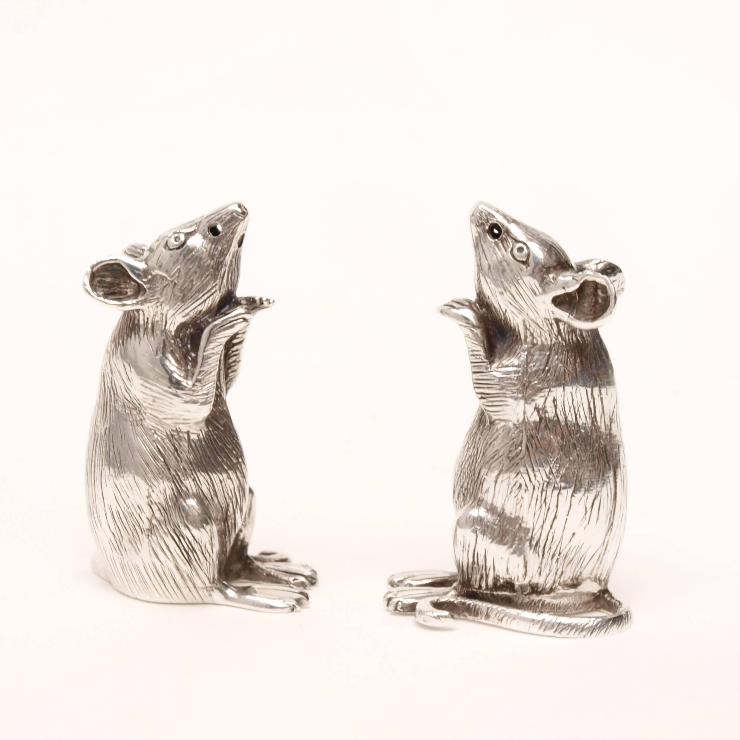 A pair of charming sterling silver mice, salt and pepper pots from the early 20th century. Hallmarked ‘925’ and ‘Sterling’ to their feet, with one other indistinguishable makers mark. Attributed to Francis Howard.