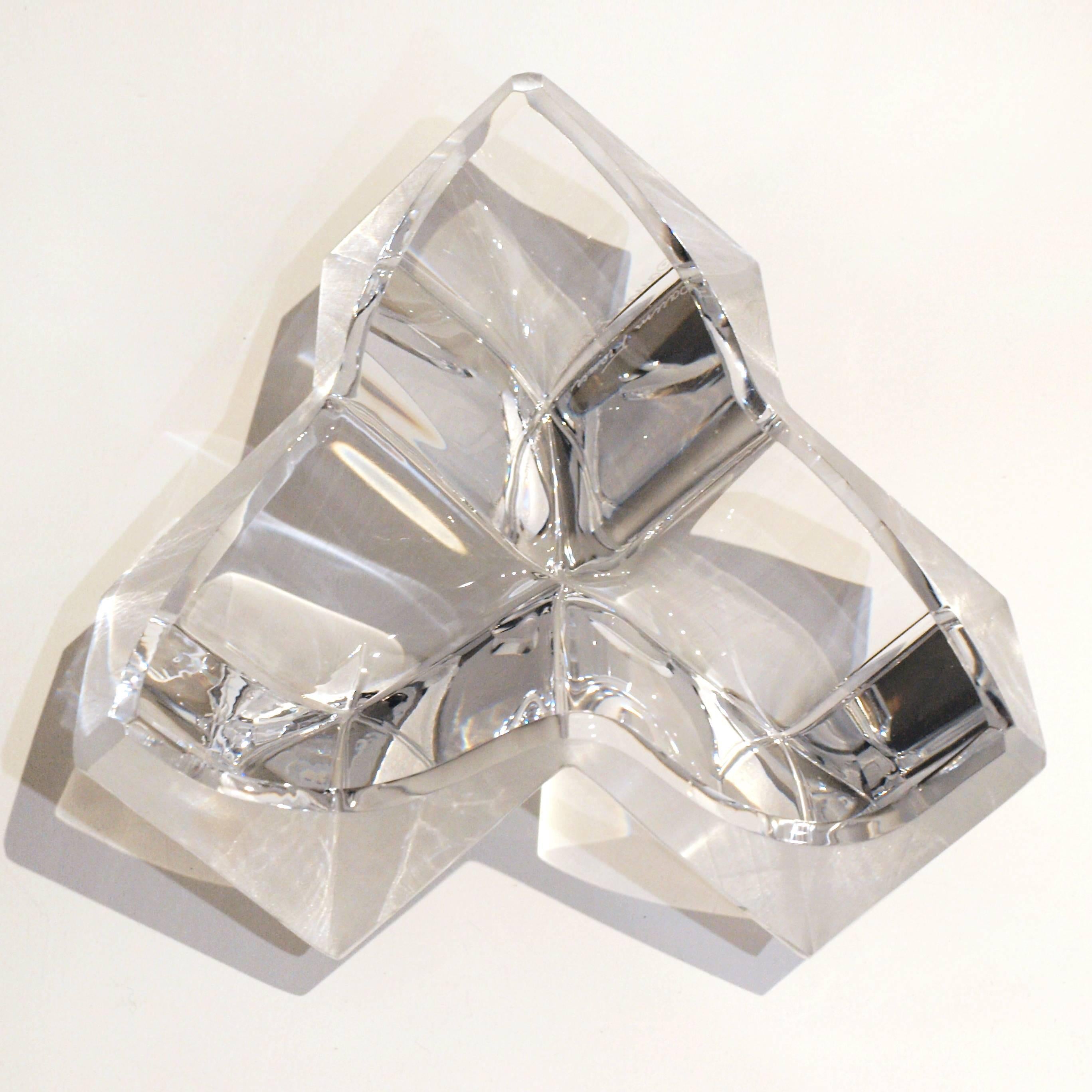 A crystal Daum centrepiece comprising of three open geometric cubes with a frosted edged. Signed Daum France to the side.