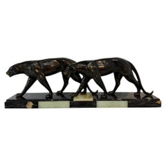 Sculpture Art déco française représentant une paire de panthères, réalisée par Maurice Font, années 1930