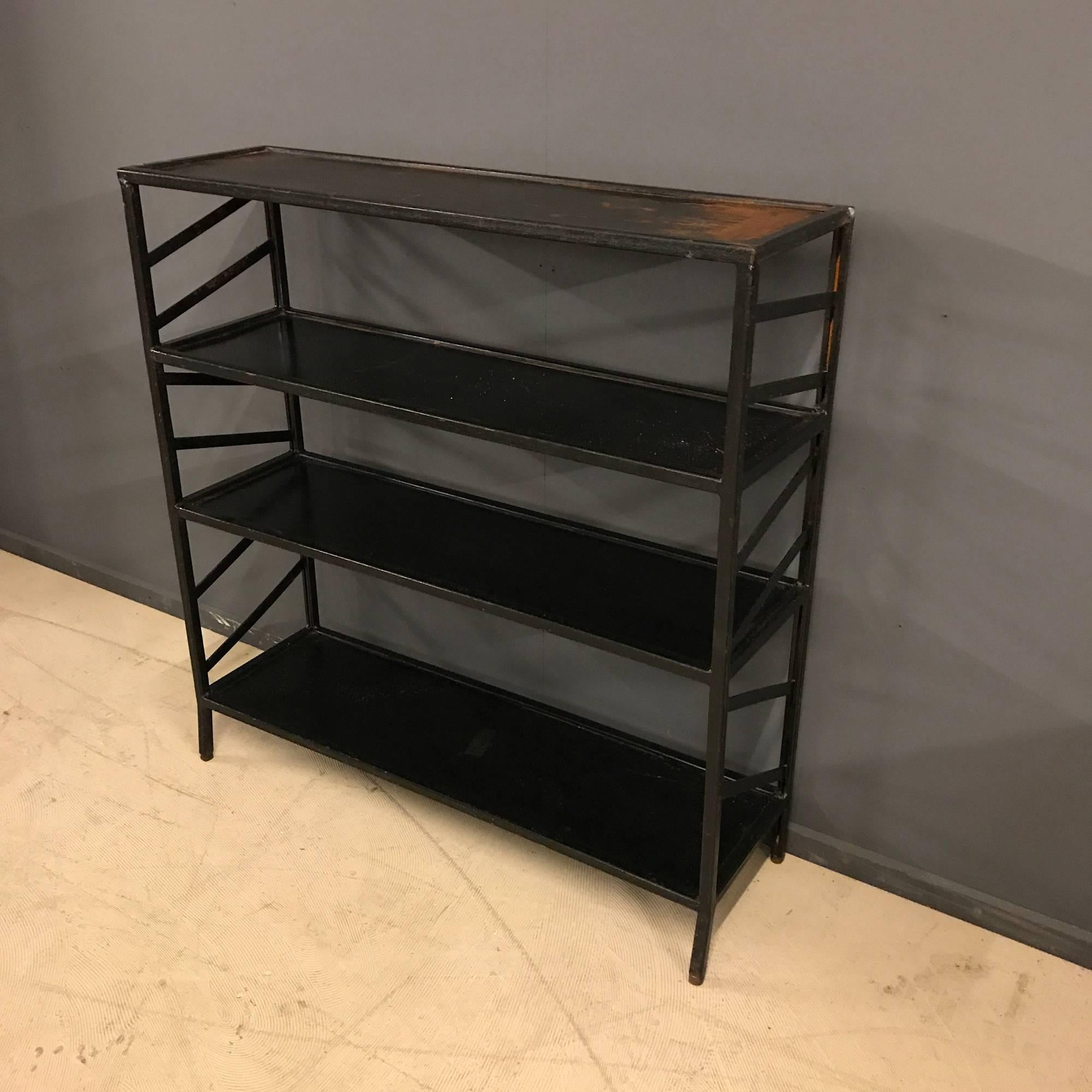 This black metal rack was used for storage in a factory. Made in Belgium during the 1920s. Nice size and good patina.