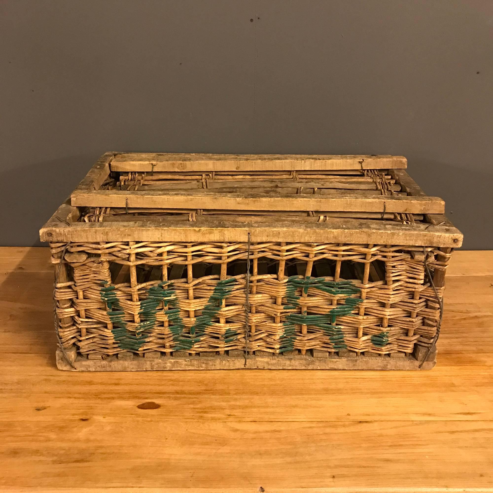 Nice vintage rattan storage basket. Made in France during the 1960s. The basket has W.R. written on it. With signs of use this basket remains in good condition.