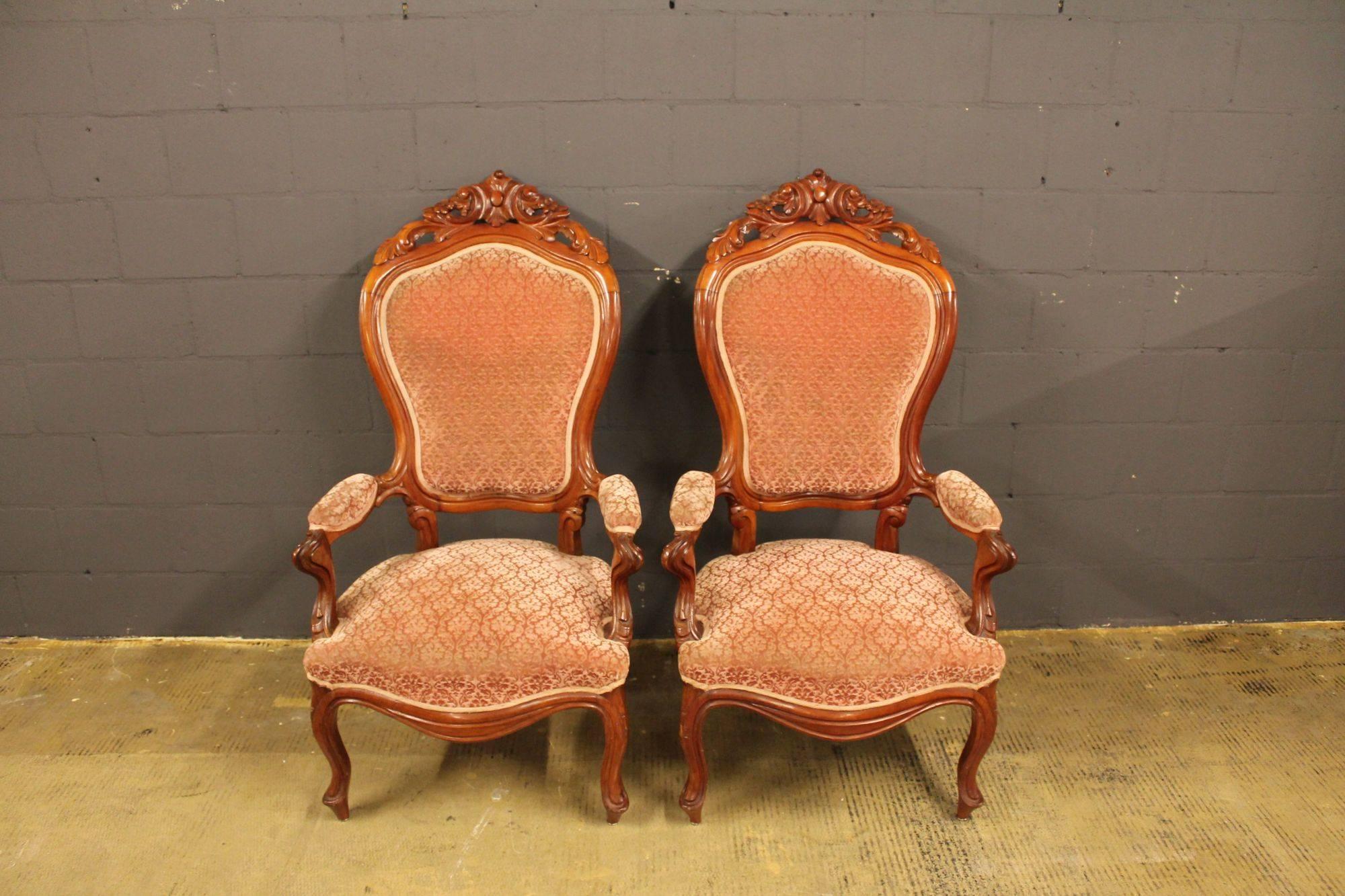 Set of two luxurious chairs in Biedermeier style. Mahogany frame and rosé coloured mohair fabric, circa 1860s.
 
