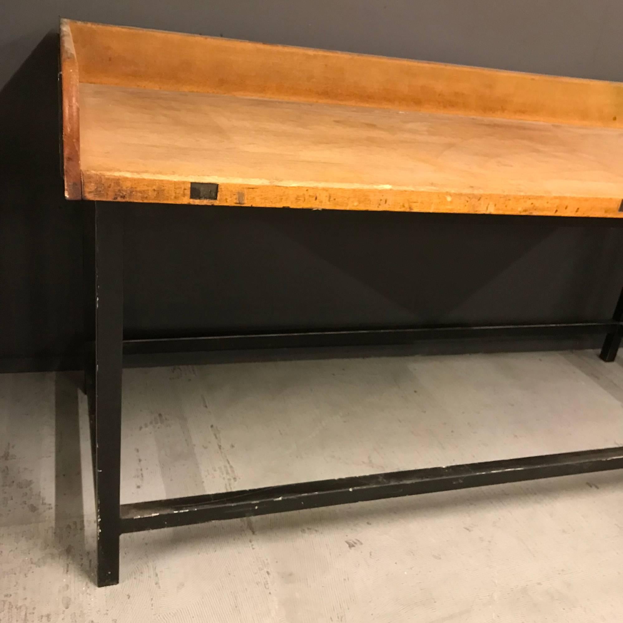 Vintage Bakery workbench with beech wooden top and black metal frame. With signs of use this workbench remains in good condition.
