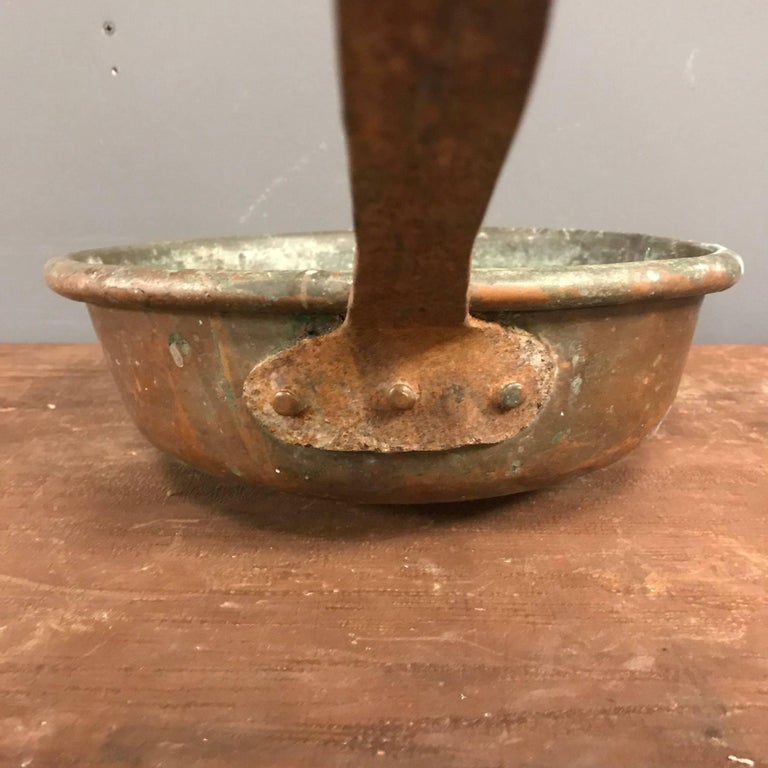 Antique oval copper pan. Remains in good condition.
