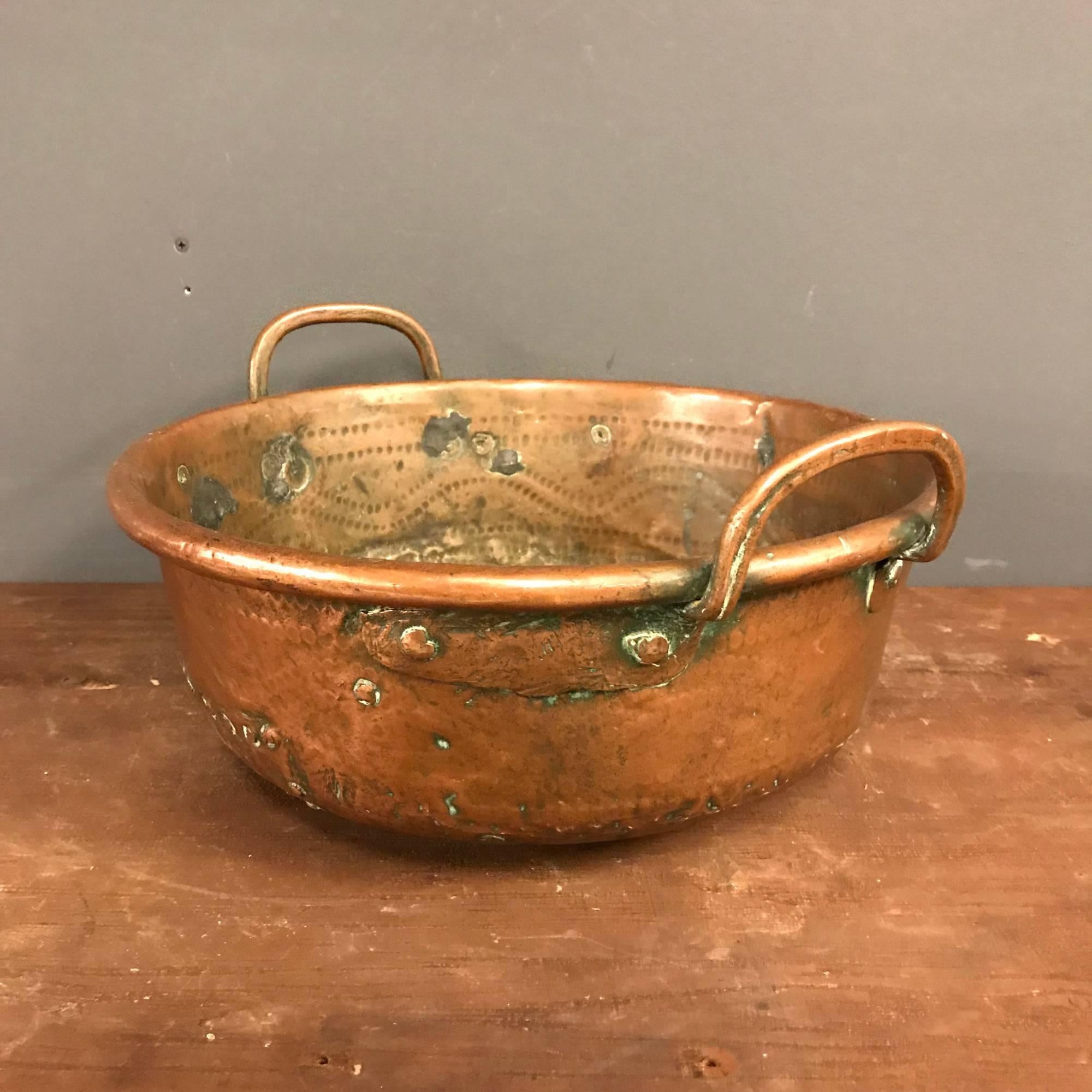 Antique hammered copper pan. Remains in fair condition.
 