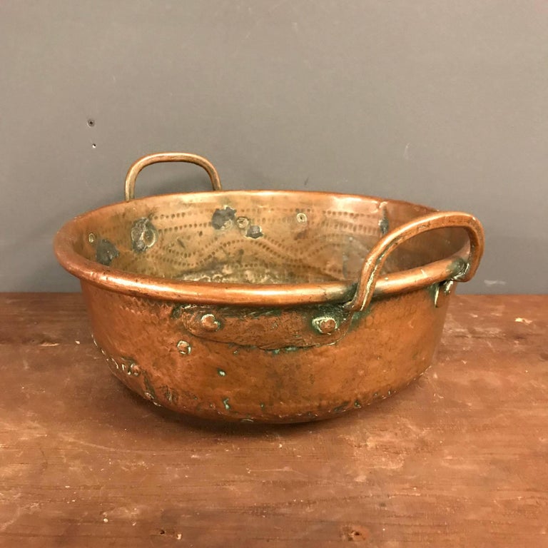Antique hammered copper pan. Remains in fair condition.
 