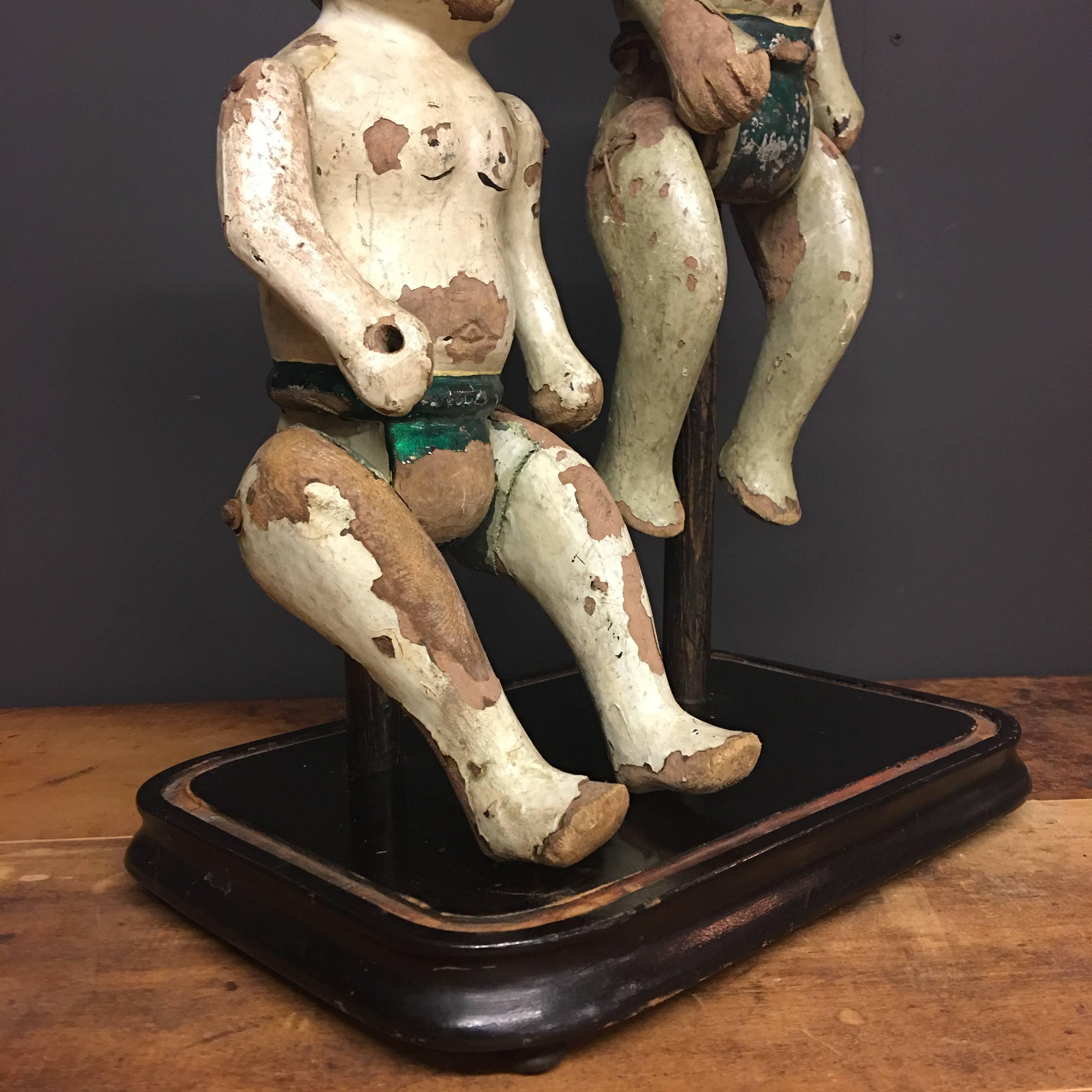 Carved Rare Pair of Antique Vietnamese Puppets 19th Century under Antique Glass Dome For Sale