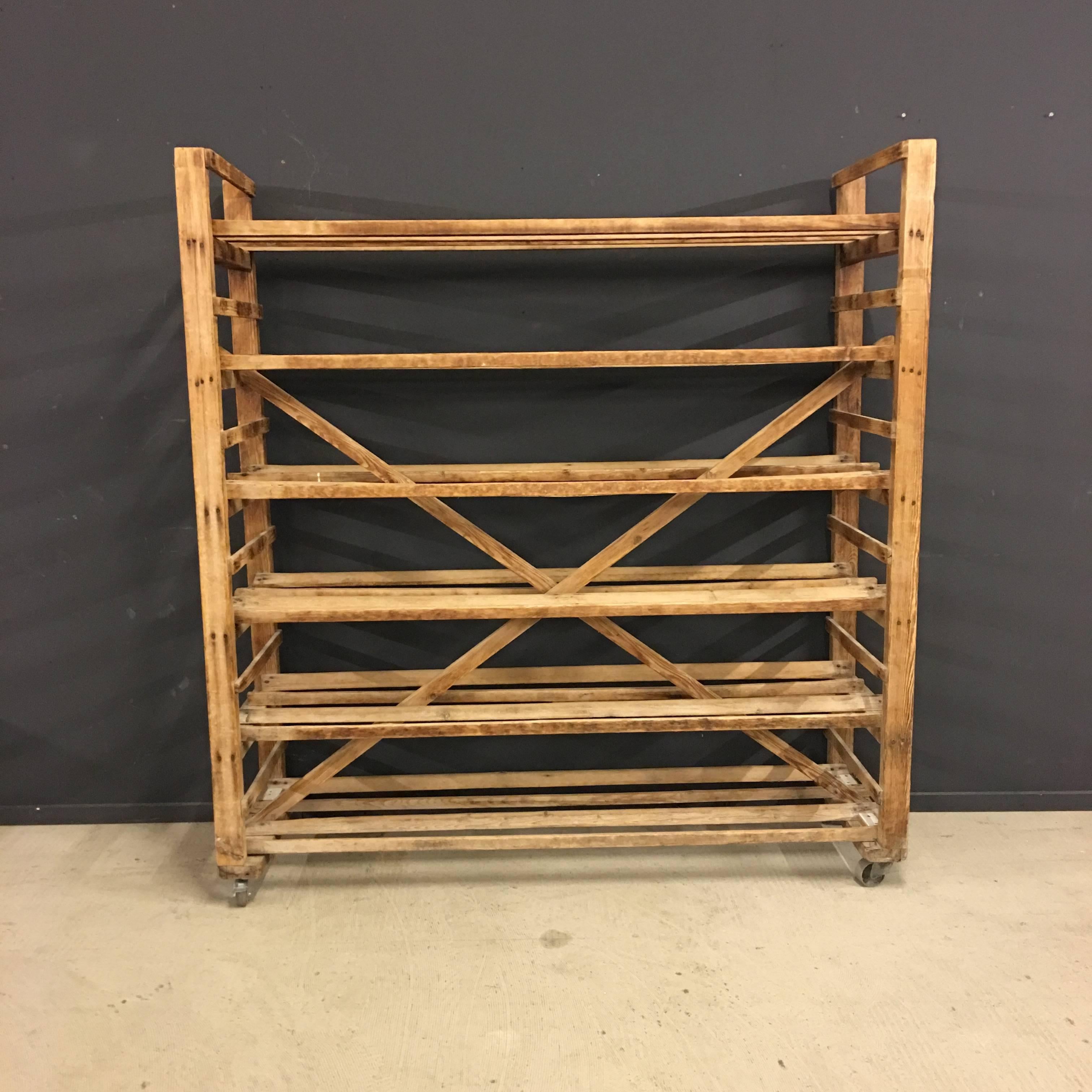 This wooden bakery rack was manufactured in belgium during 1930s. Made of pine wood.