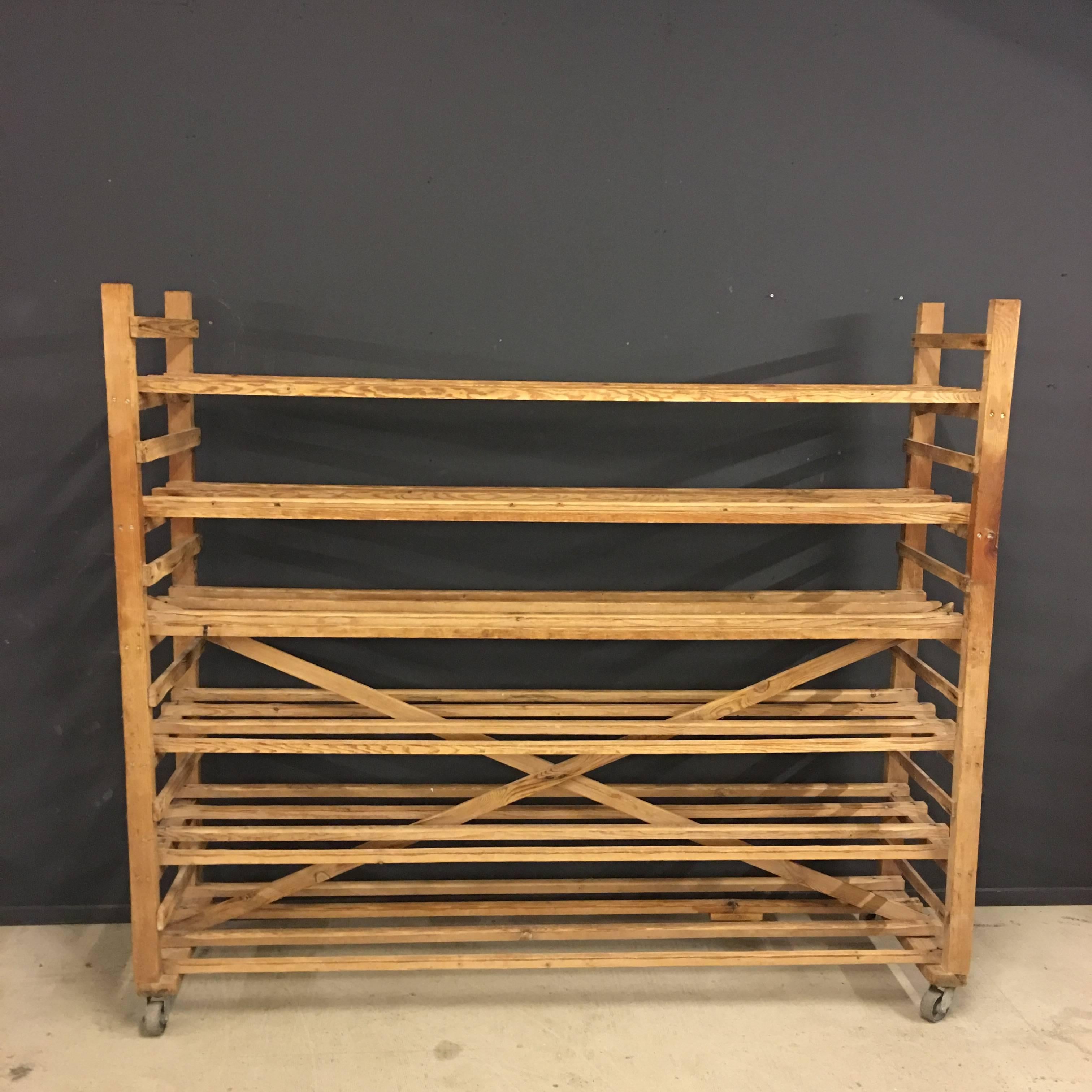 This wooden bakery rack was manufactured in Belgium during 1940s. Made of pinewood.
 
