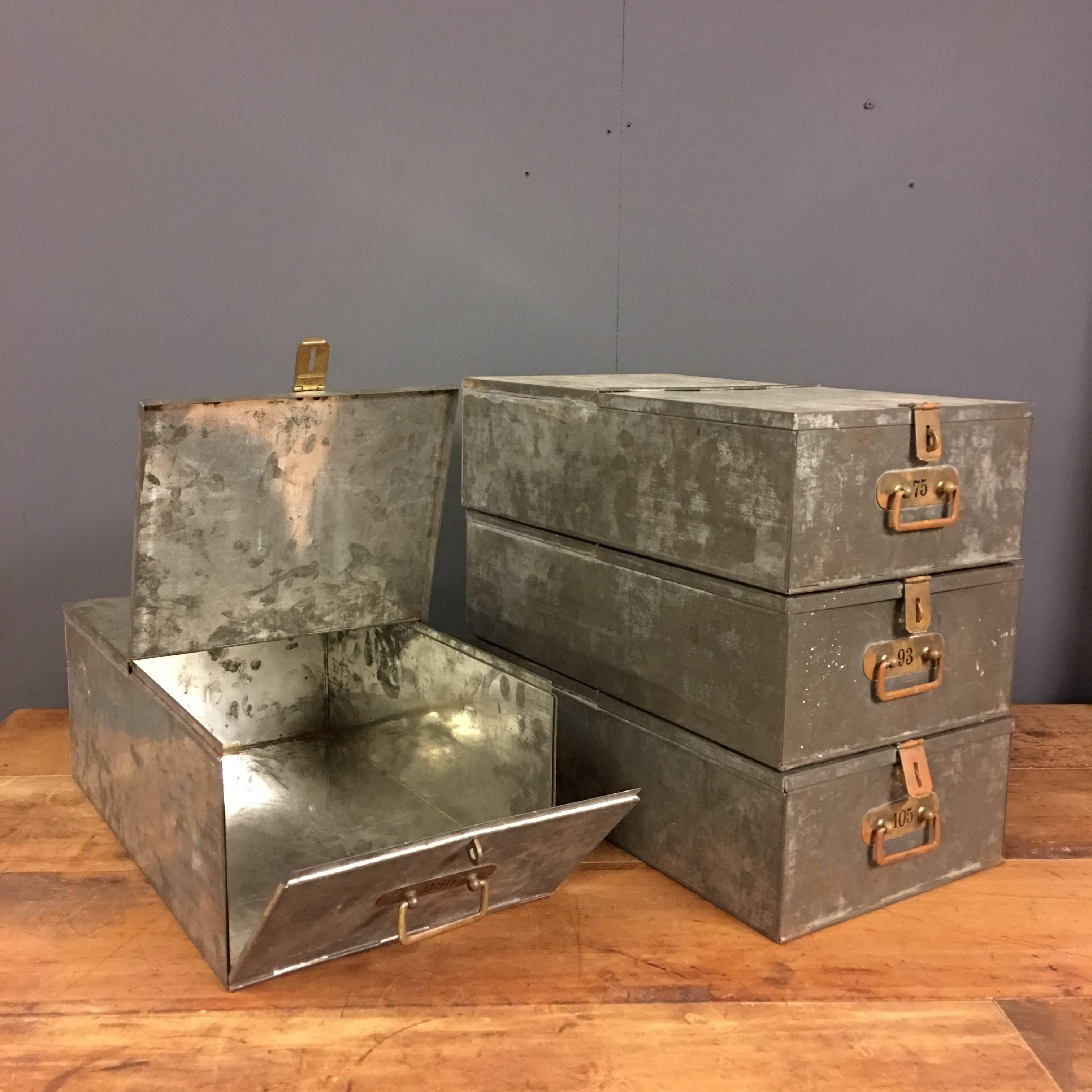 Antique bank box. Manufactured by the famous Parisian Locksmith “Fichet” for the Swiss Federal bank in 1912. Beautiful numbered brass handles. Stunning display in any house or office. The have two hinges, top and front. Unique piece of Swiss banking