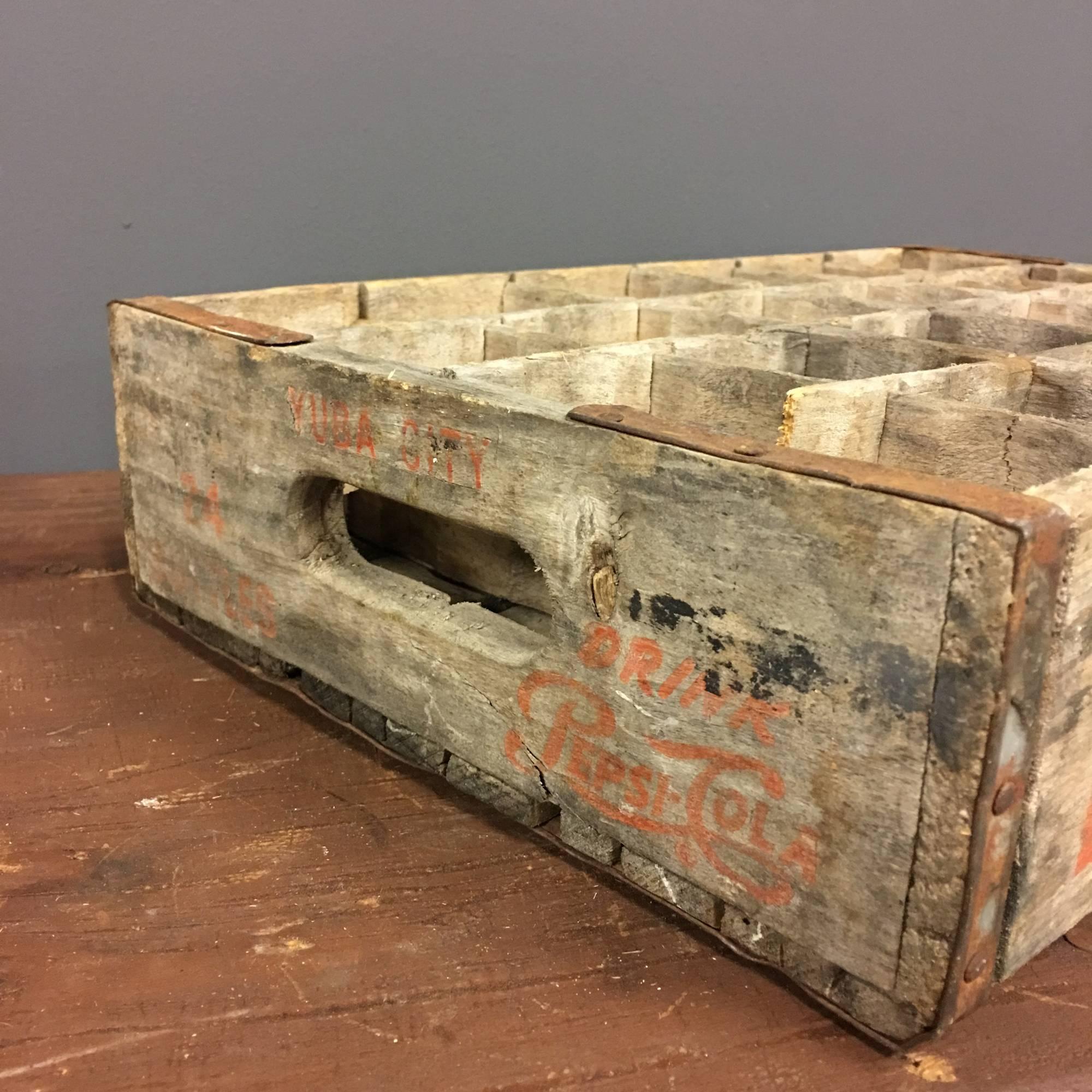 Vintage wooden Pepsi crate from USA. Red logo with room for 24 bottles.