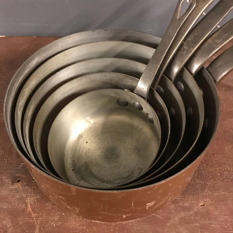 Set of five antique copper pans. Made in France during the 1930s.
These pans have been retinned. All pans remain in good condition. Price for the set of five.

   