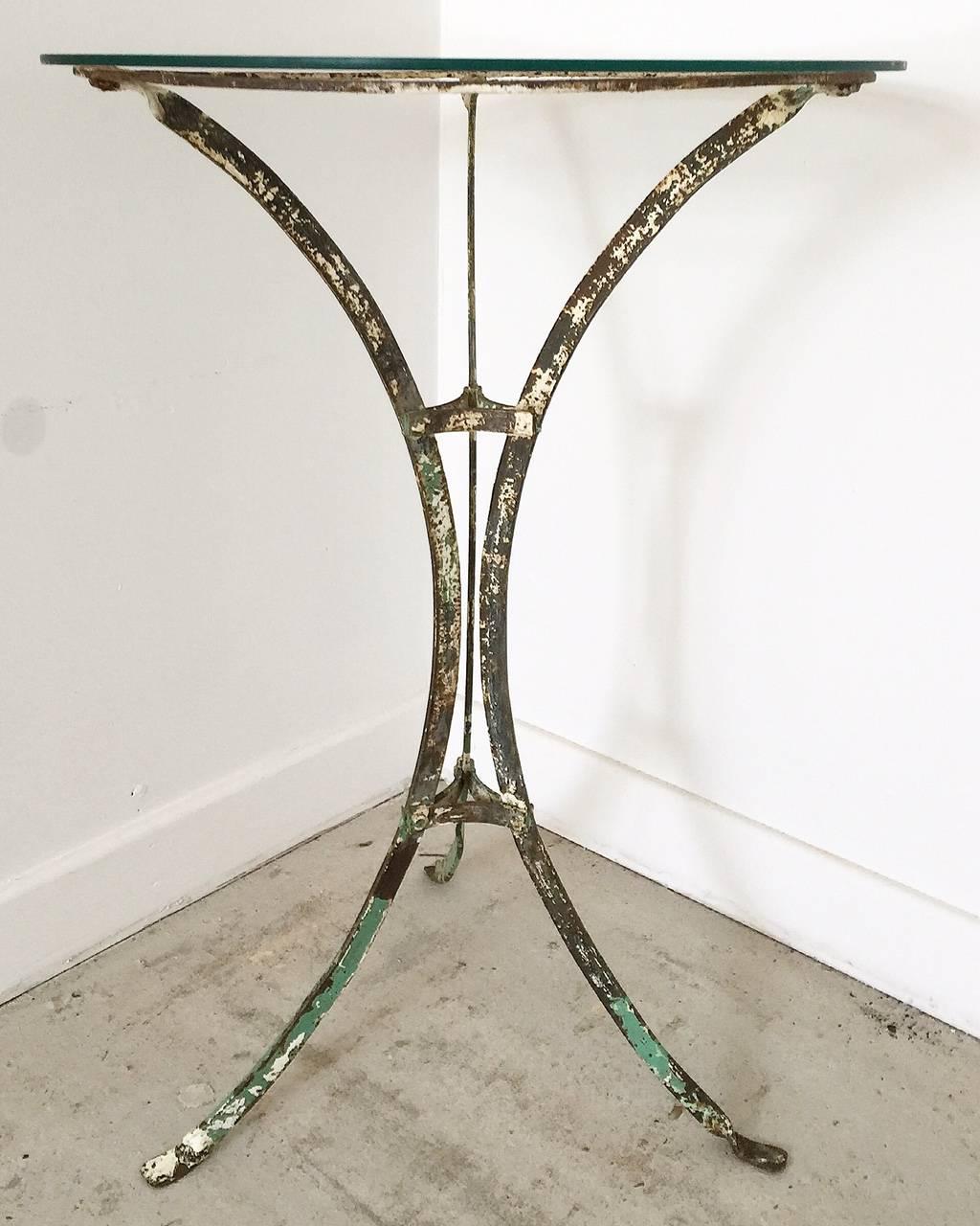 French Wrought Iron Glass Topped Garden Cafe Bistro Table In Distressed Condition In Hartlepool, GB