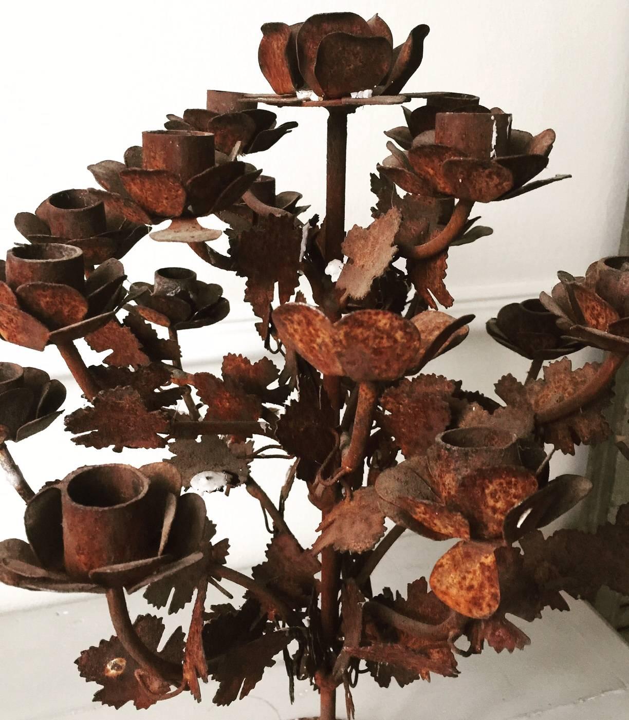 Vintage French cast iron candelabra center piece in floral form.