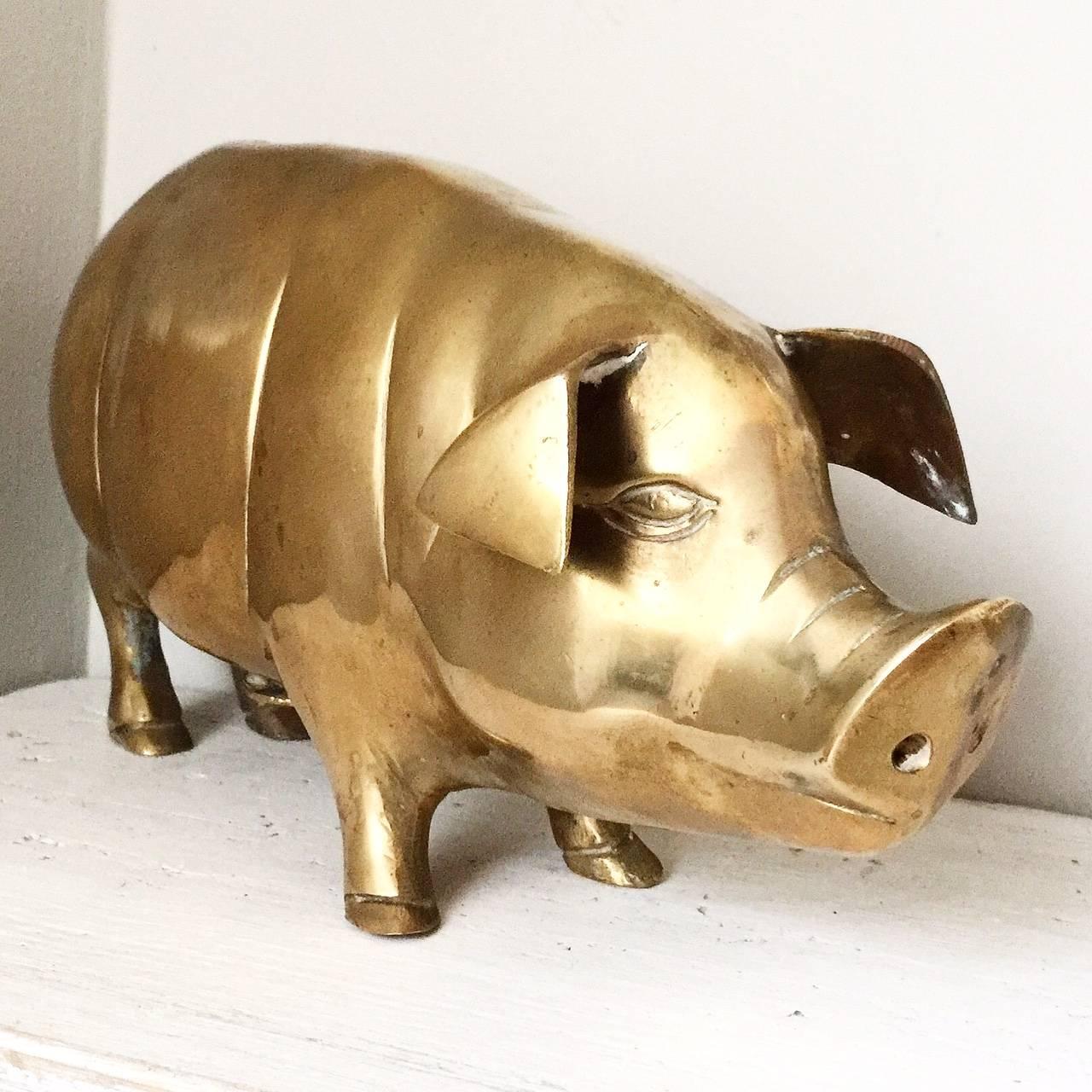 Antique English cast brass pig butchers shop display money box.