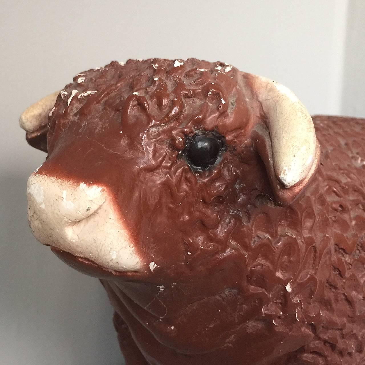 Fantastic butchers shop retail display model of a hereford bull made from plaster. This bull has a slot so can be used as a money box.