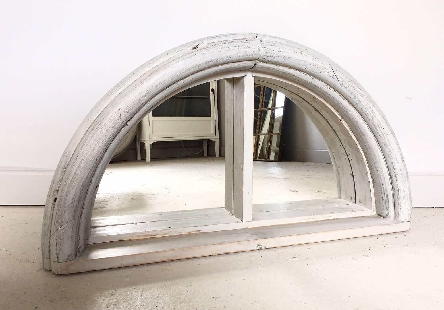 Vintage antique architectural demi lunar window frame converted in to a stylish mirror with a distressed paint finish suitable for inside or the garden.
