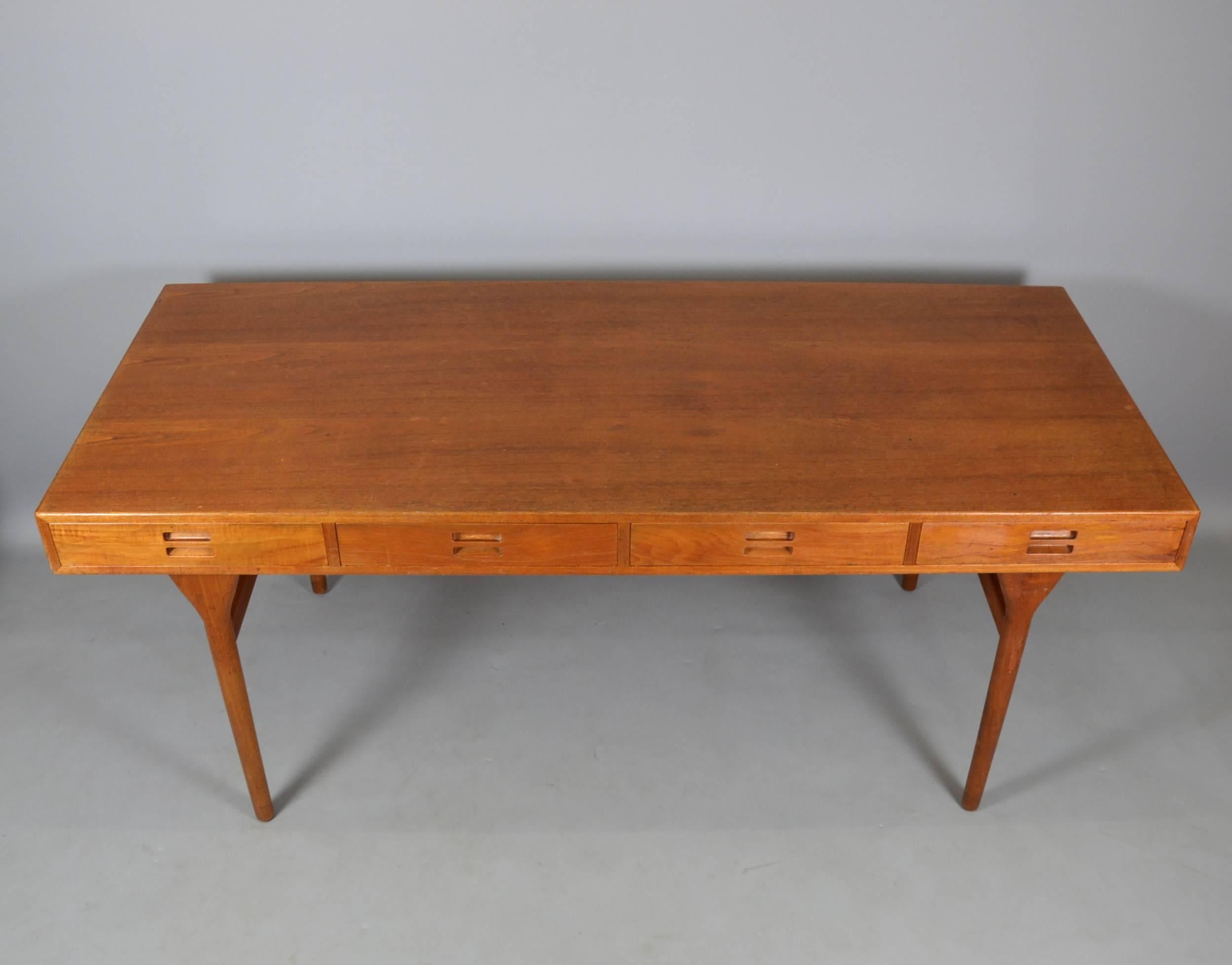 Designed by Nanna Ditzel in 1958. Produced by Søren Willadsen Møbelfabrik, Denmark. Teak desk with four drawers.