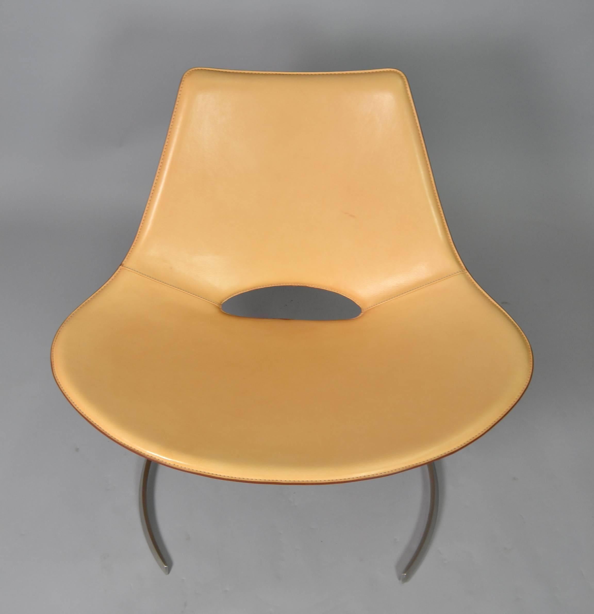 Designed by Jørgen Kastholm and Preben Fabricius in 1963, produced by Bo-Ex, Denmark. Matte chromed steel, shell in wood with upholstery in cognac aniline leather.