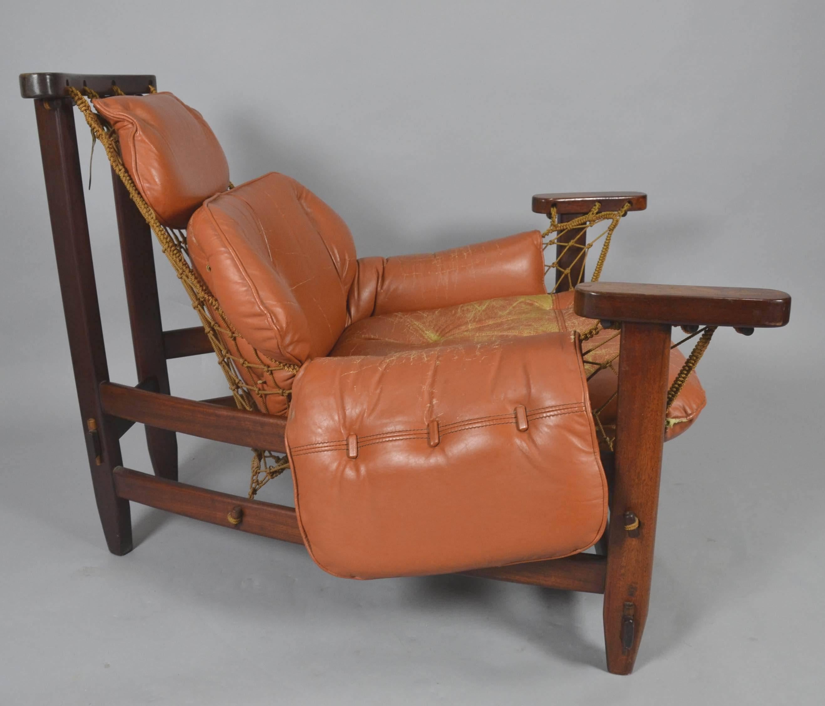 Leather Jean Gillon Captain's Chair and Ottomane For Sale