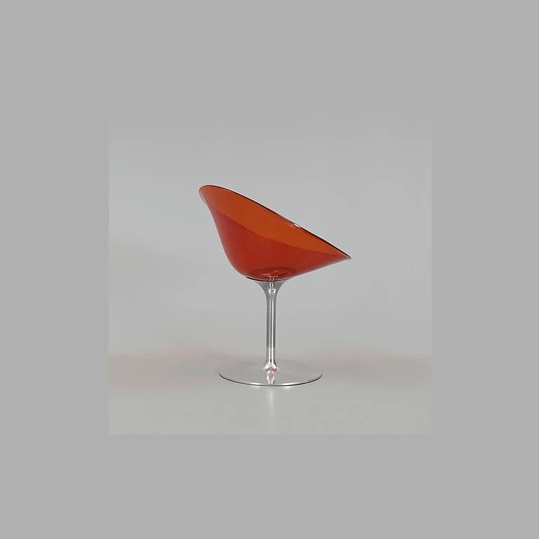 Designed by Philippe Starck, one of the most influential designers of the international scene and produced by Kartell. Swivel, with a shell shape that recalls the 1960s. Chrome-plated metal and polycarbonate seat orange. One of the highest