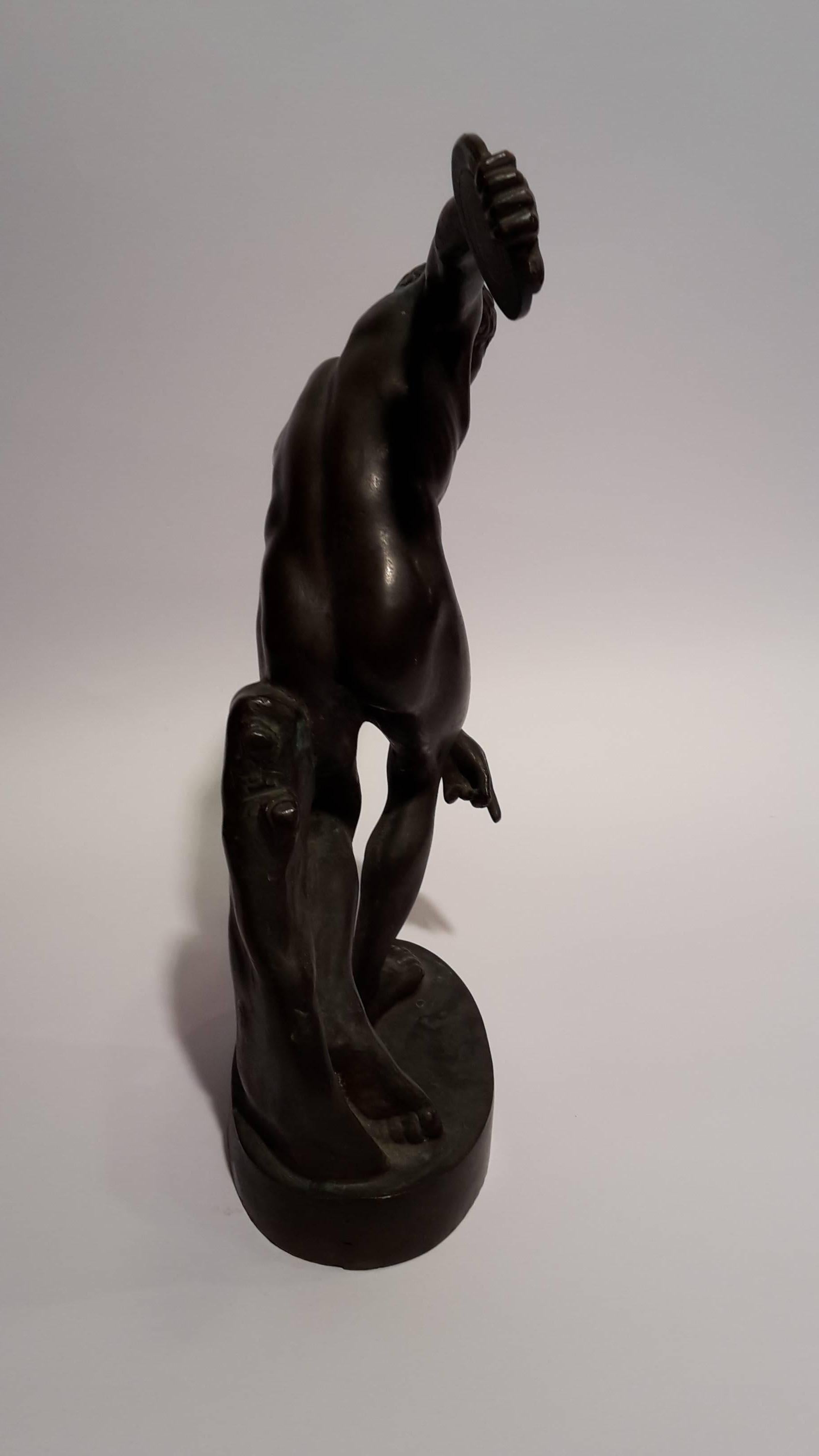 Bronze statue of the Discobolus.
The Discobolus is a sculpture built around 455 BC (period between pre classic and classic) by Myron.
The statue depcting this famous athlete, is inspired by the original Discobolus, recognized as example maximum