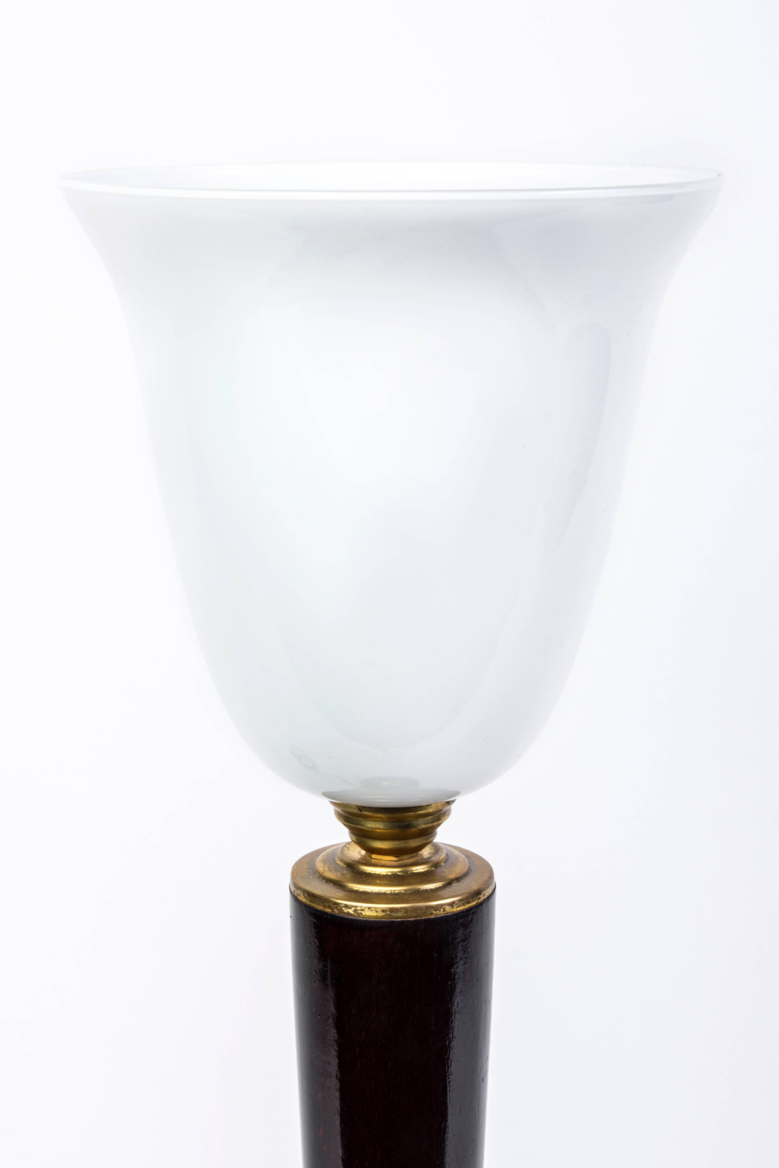 This wonderful 1930s French Art Deco tabletop lamp by Mazda features a wood base with brass detailing with a pearl opaline glass shade. It has been newly rewired and is in excellent condition.