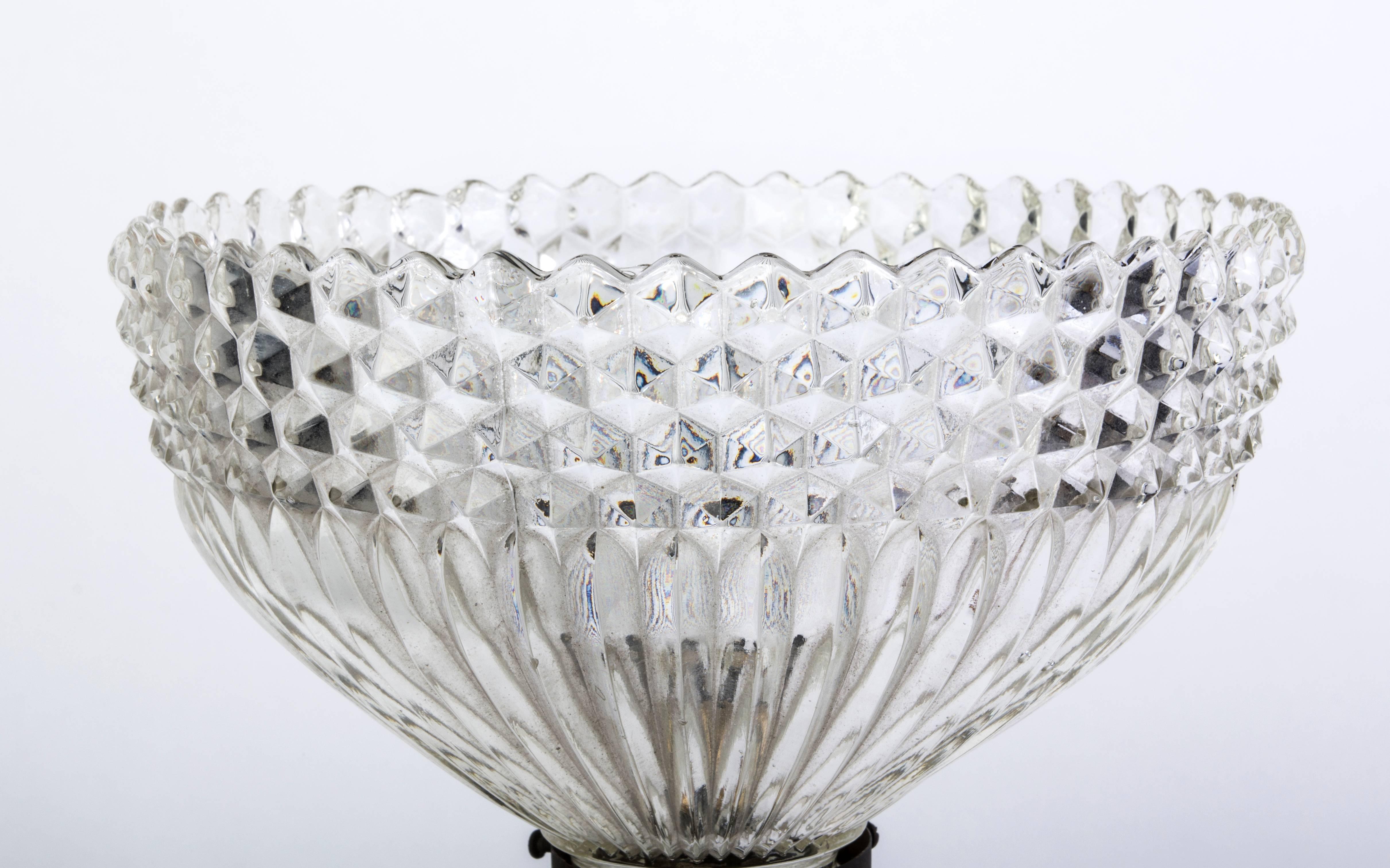 This beautiful French Art Deco table lamp, circa, 1925 is from the pre-war period, with a bronze signature badge and inventory number under the base showcasing it's authenticity. It features a gorgeous original crystal shade and a high gloss
