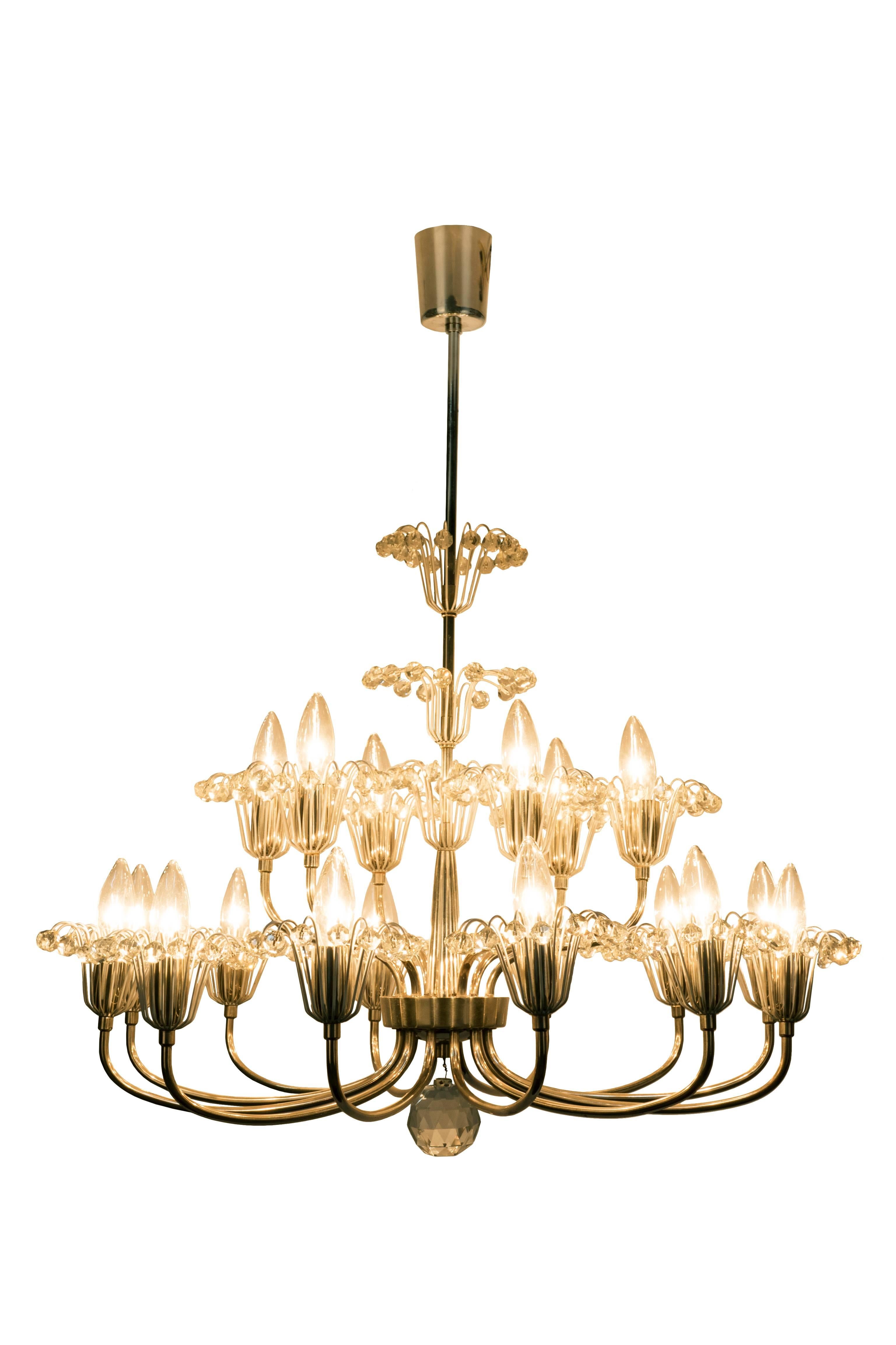 Grand fountain chandelier by Emil Stejnar for Rupert Nikoll in silvered brass with crystal pearls with 18 lights.

Made in Austria, circa 1960.