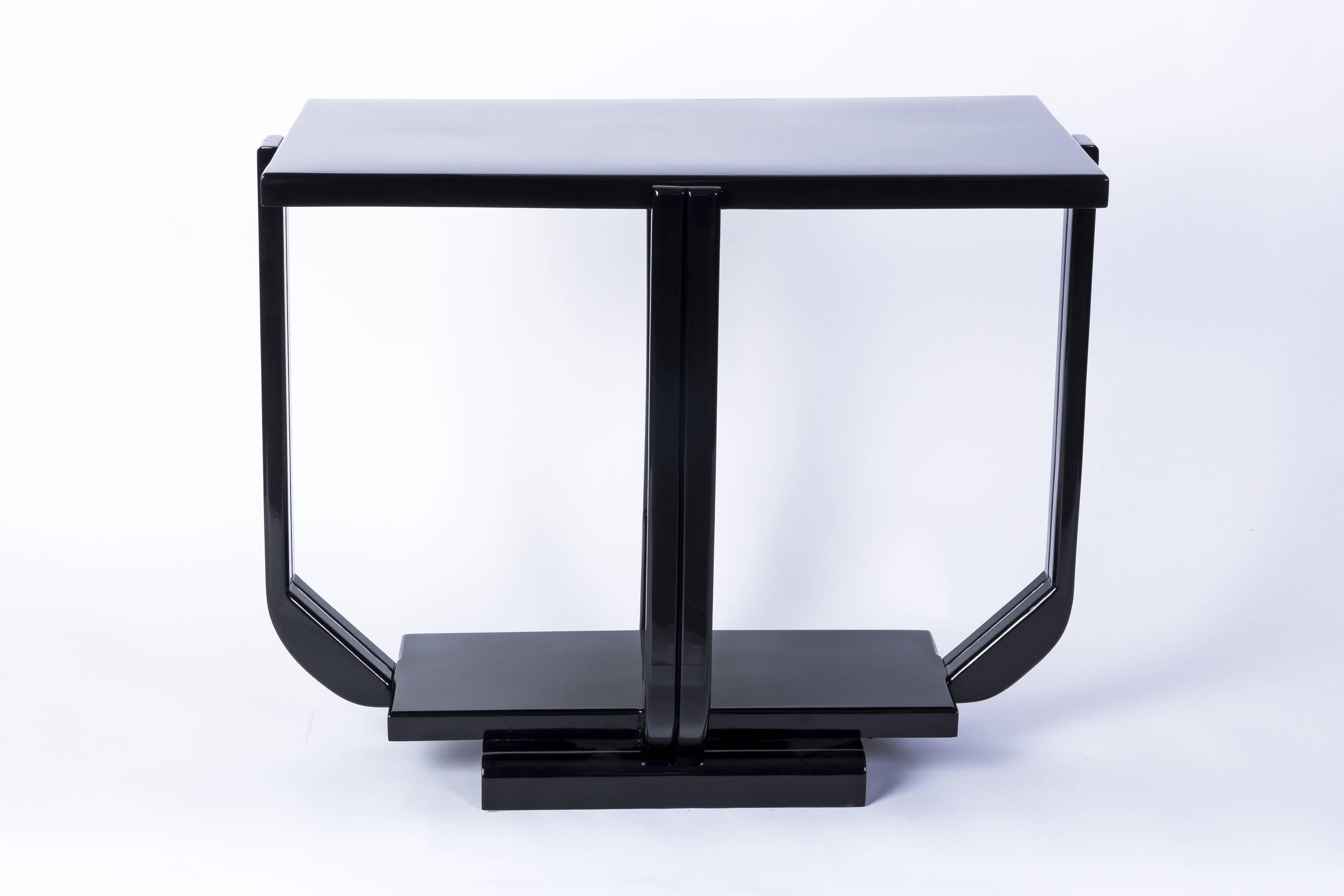 Gorgeous rectangular solid mahogany coffee/side table lacquered in black.