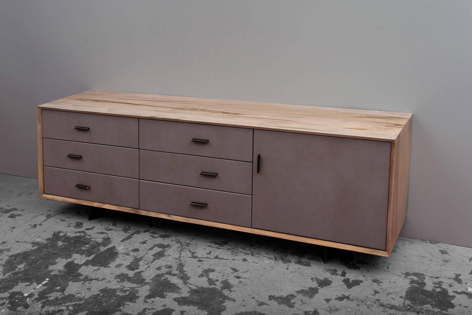 The Sentient Murlough Dresser is a refined storage piece that uses locally-sourced American maple. Each dresser is handmade to order in Brooklyn. The unique grain and characteristics of the wood created during the growth process in the forests of