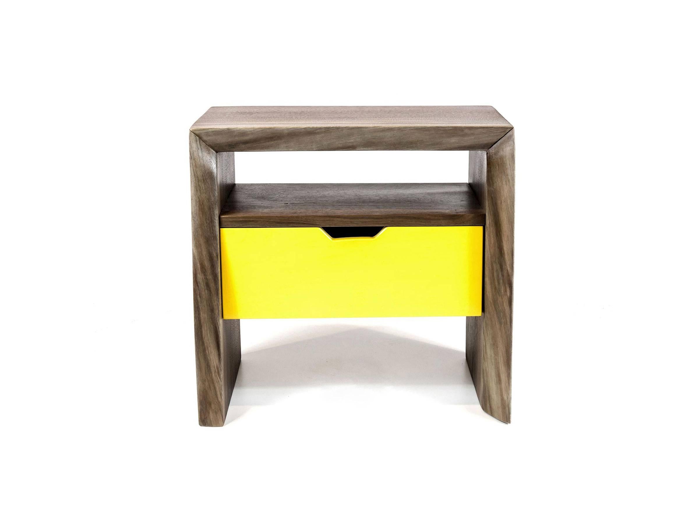 The SHIMNA live nightstand features a mitered live-edge board on the three facing edges, and a painted drawer with an angled mission-style pull. Here it's shown in Pennsylvanian black walnut finished in a clear water based polyurethane.

Designed