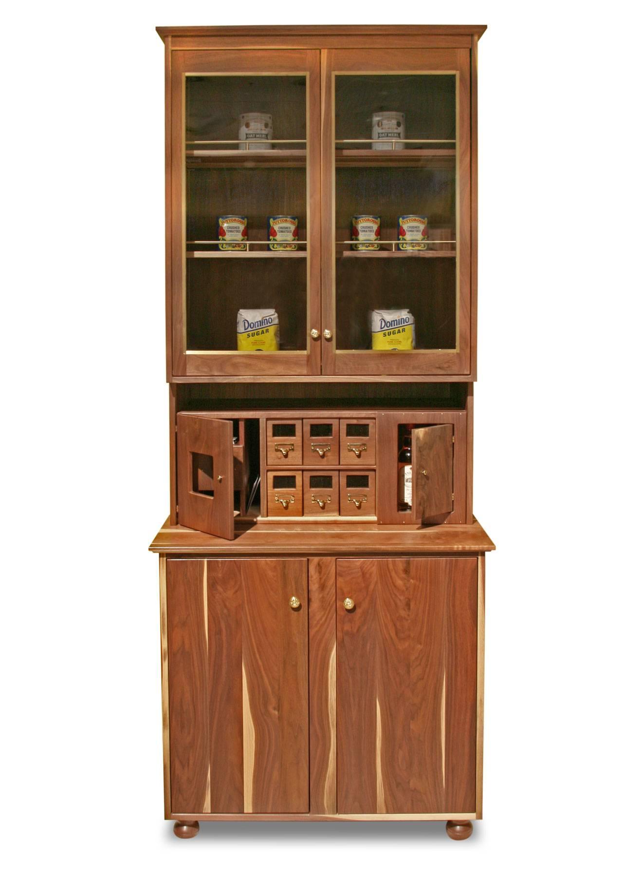 This listing is for a very tall and large walnut cabinet based on a wine cabinet Shimna built for the renowned restaurant Atera in Tribeca. It was made for the International Contemporary Furniture Fair in 2012. 

The upper cabinet has two large