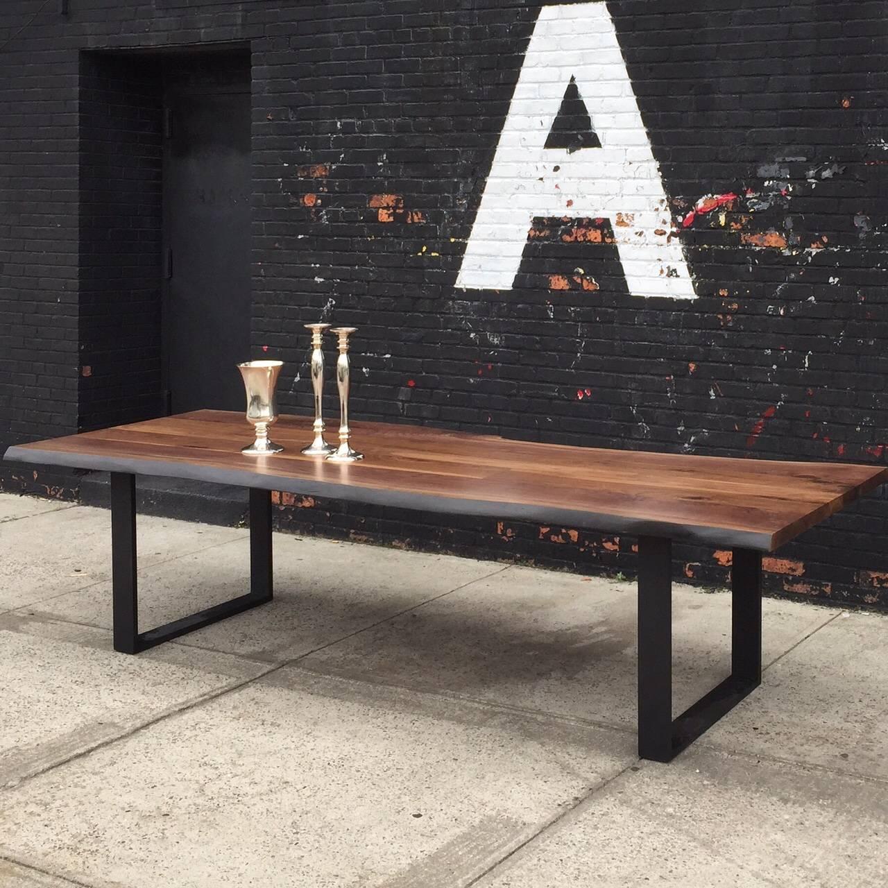 Solid American black walnut live edge tabletop paired with our solid blackened steel wishbone legs at 120