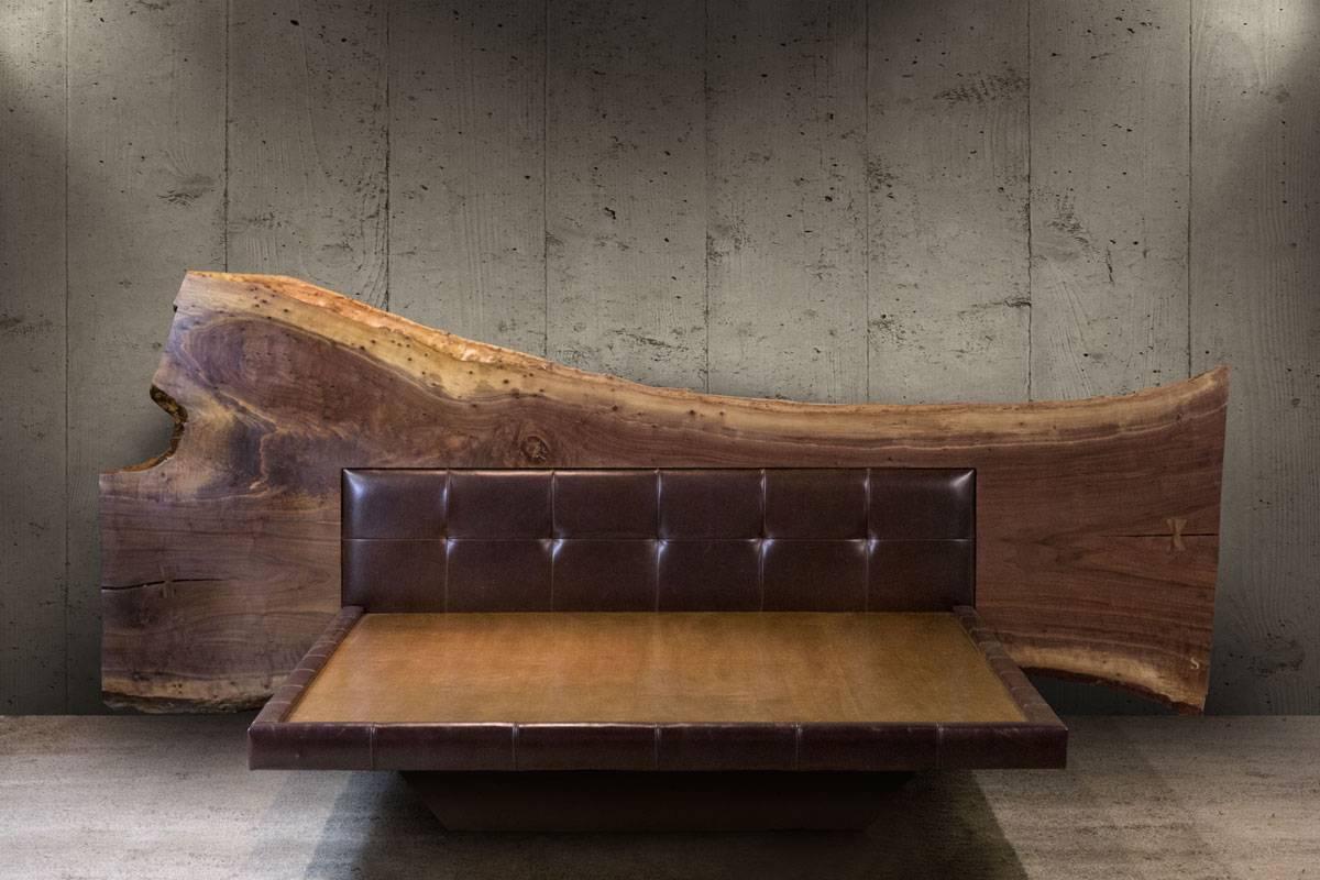 A bed fit for a king (here, fit for a queen). The Sentient Live-­Edge Bed combines the majesty of a large live edge slab with hand­-tufted leather and a sturdy floating platform for a reassuring slumber.

Handcrafted in Brooklyn, New York.
Live