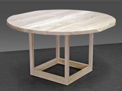 Sentient Flow Round Pedestal Table in Ambrosia Maple with Live Edge